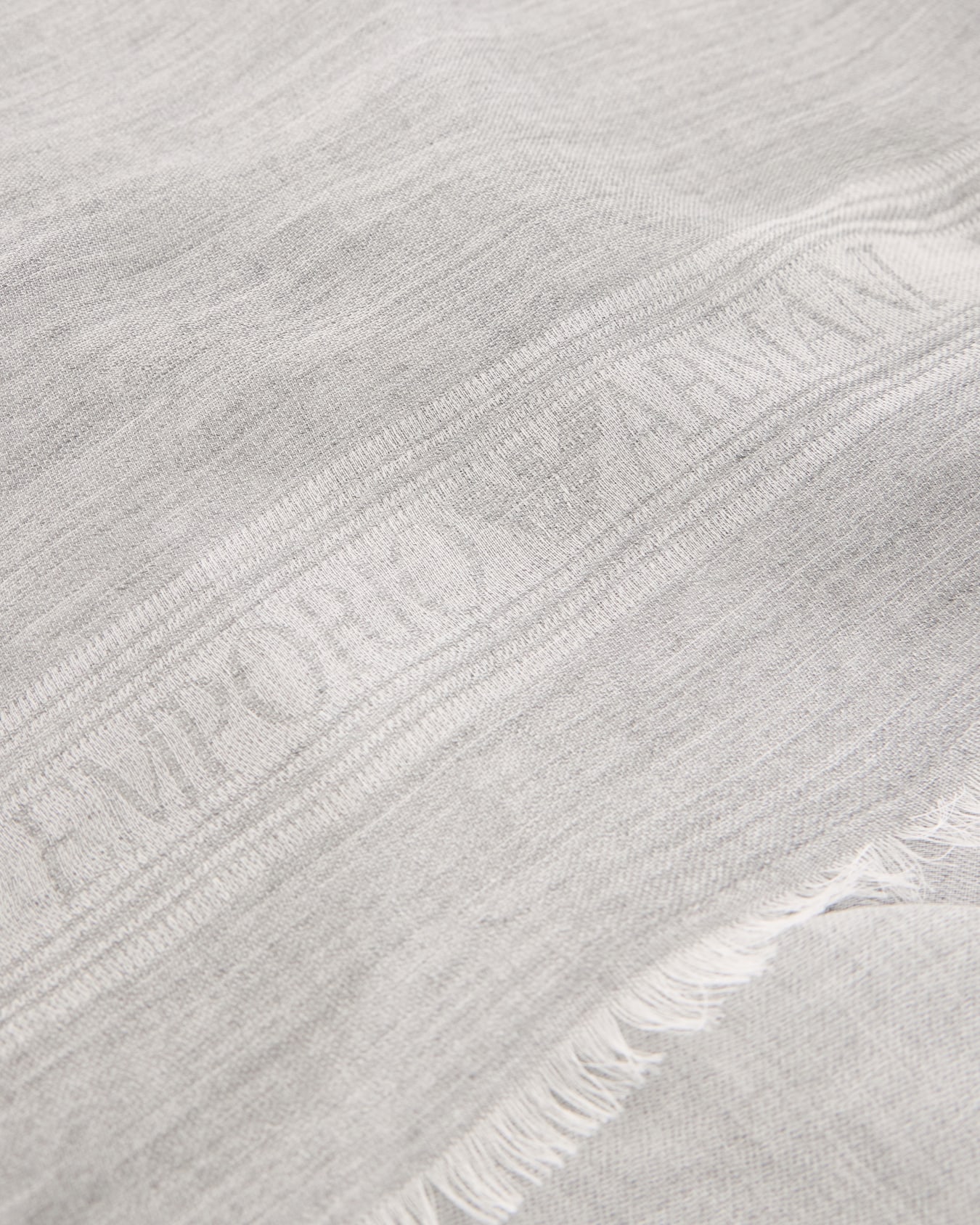 Scarf in viscose and modal jacquard with fringed edges Slide 1