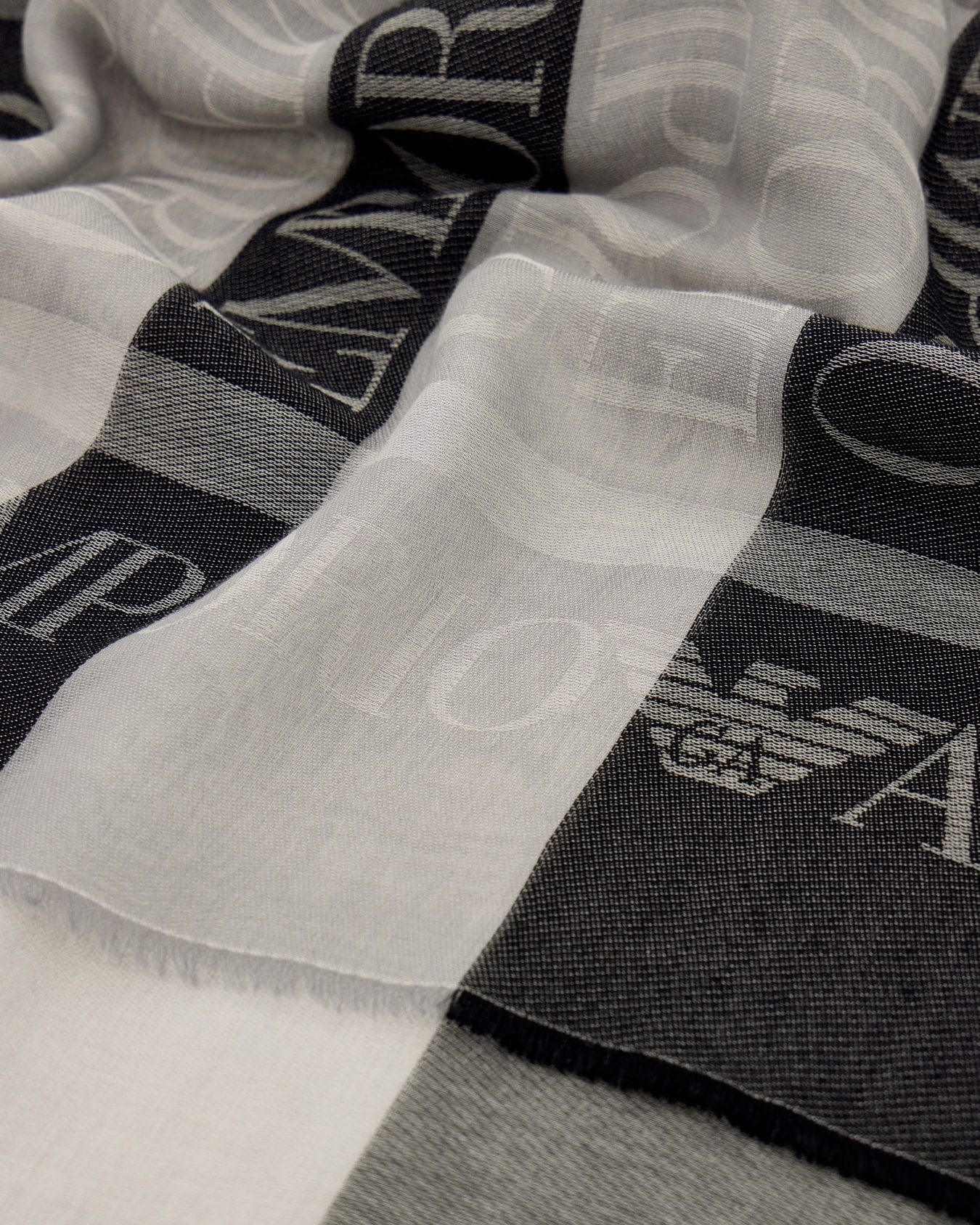 Stole in striped jacquard cotton with logo pattern Slide 1