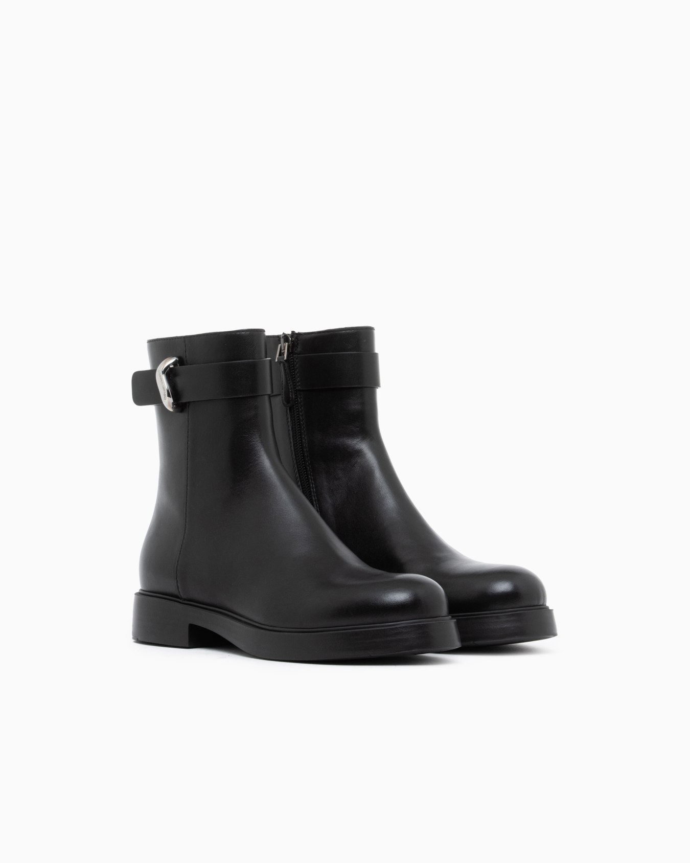Leather ankle boots with side zip and buckled strap Slide 1