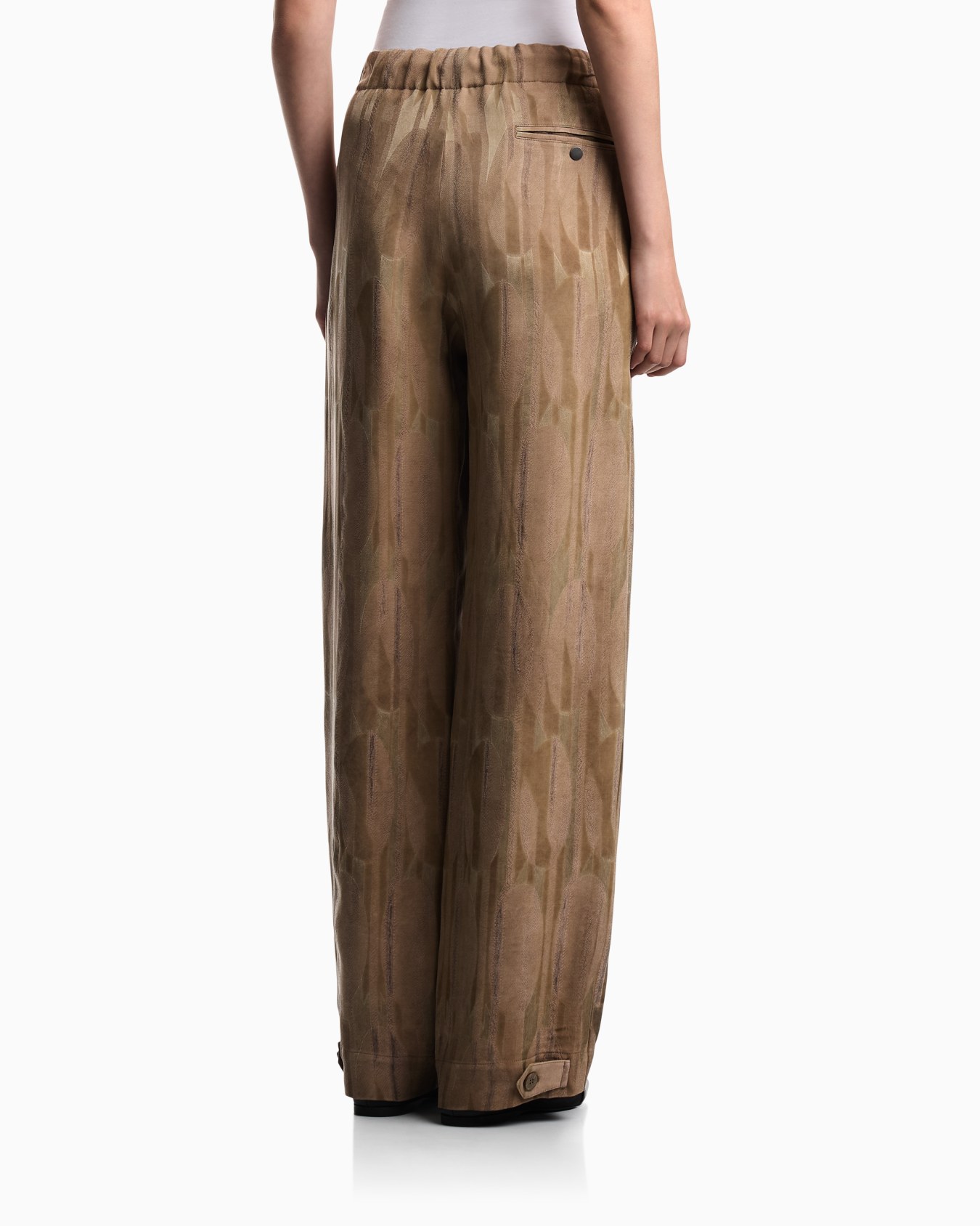 Oval-patterned jacquard trousers Slide 5