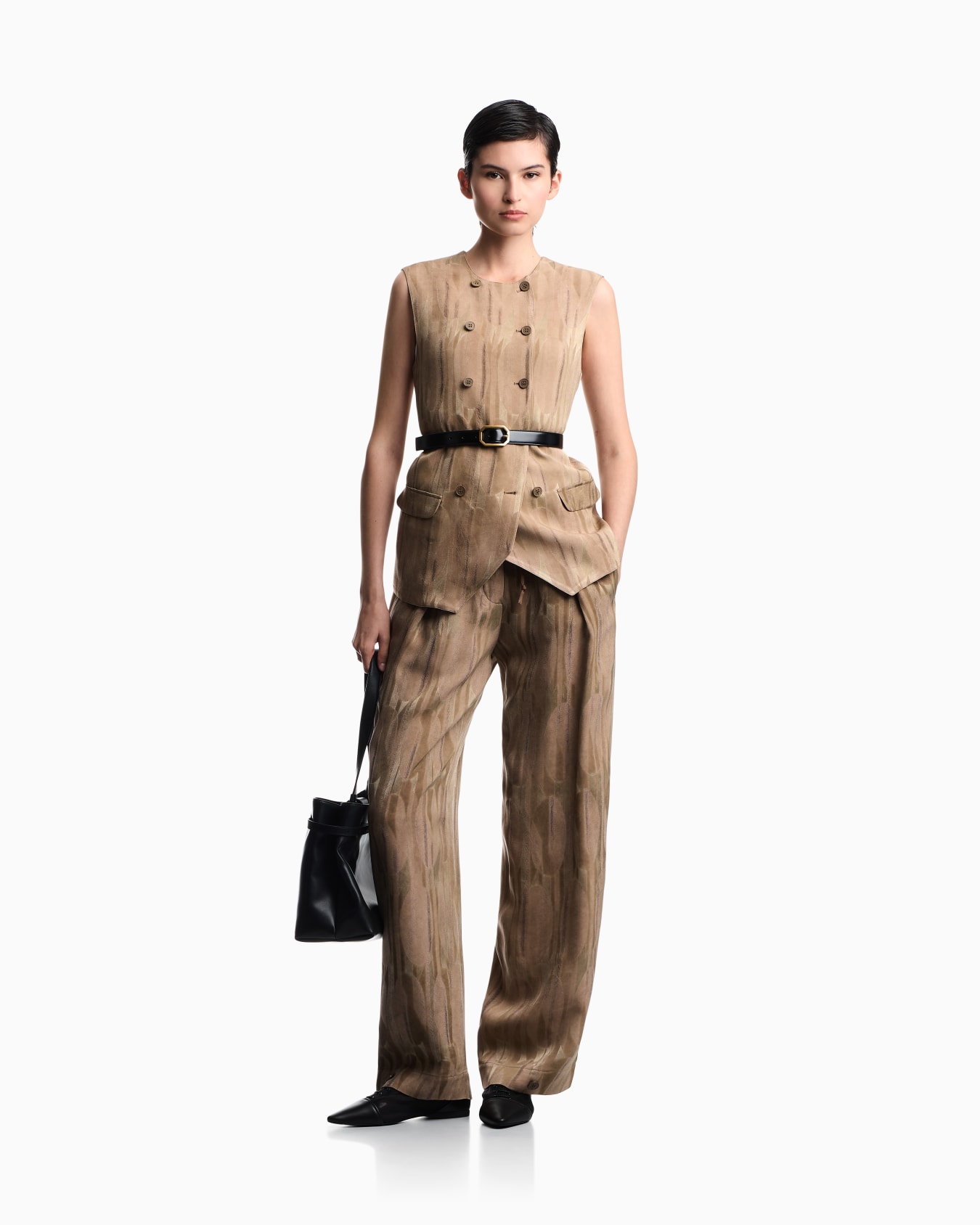 Oval-patterned jacquard trousers Slide 1