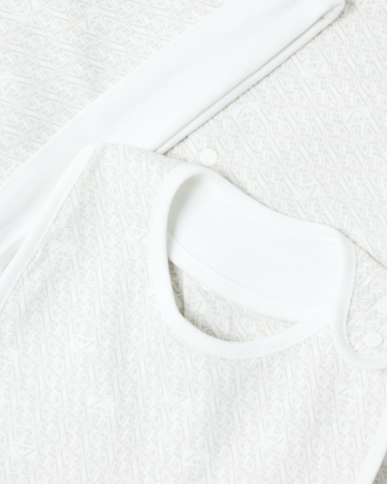 Bib and cap set in all-over EA logo jersey Slide 1