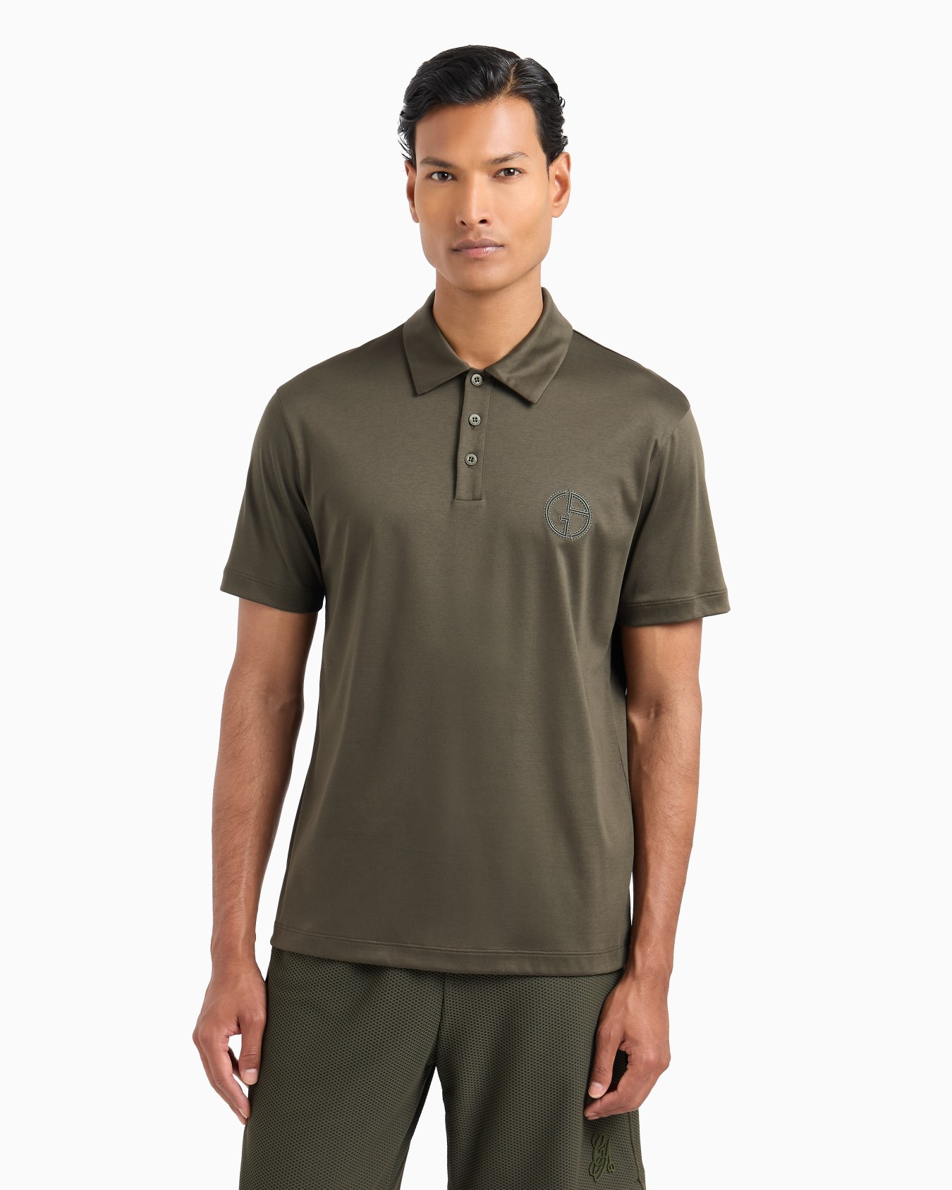 Short-sleeved polo shirt in cotton interlock Slide 1