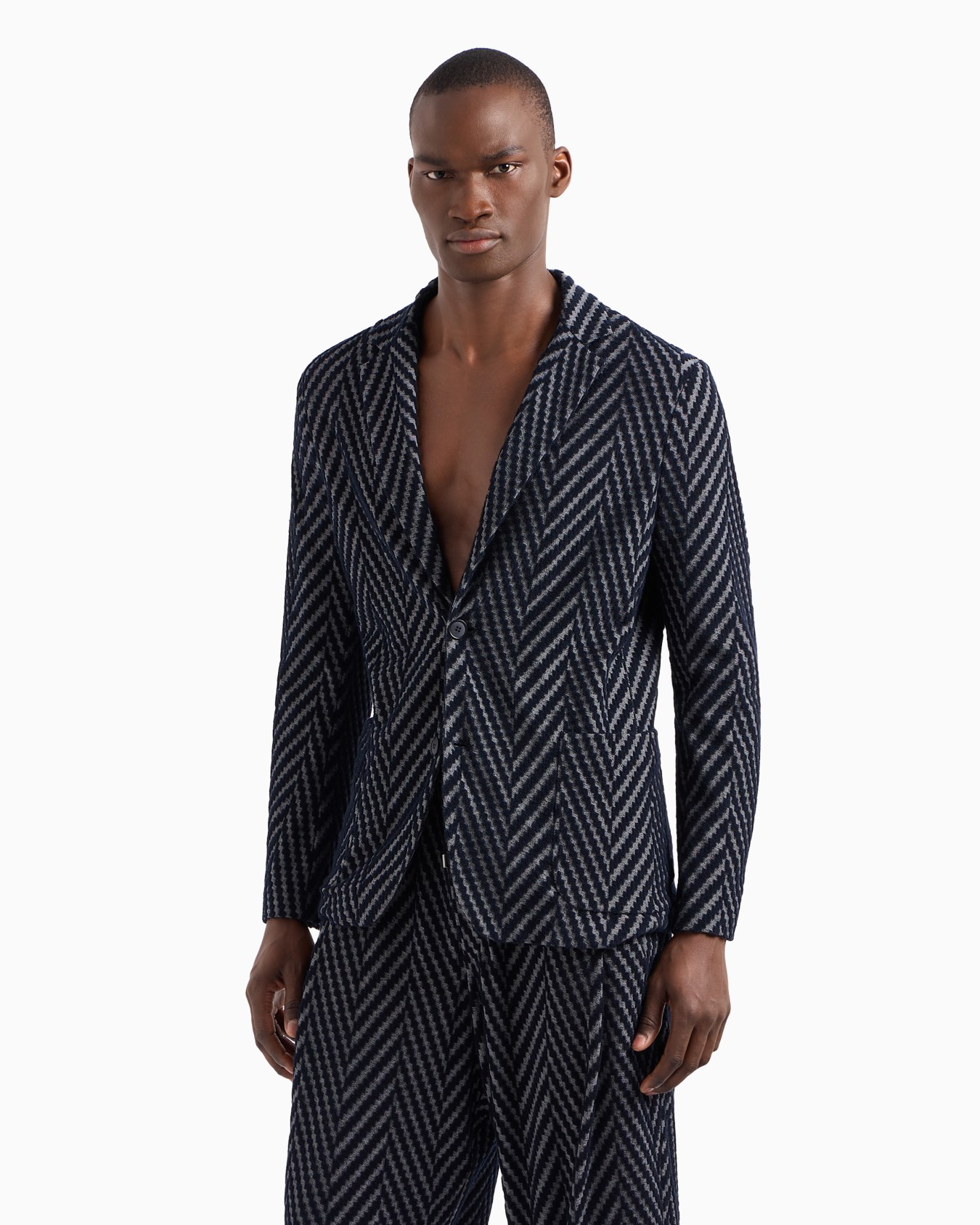 Single-breasted jacket in viscose and cotton-blend chevron jacquard jersey Slide 1