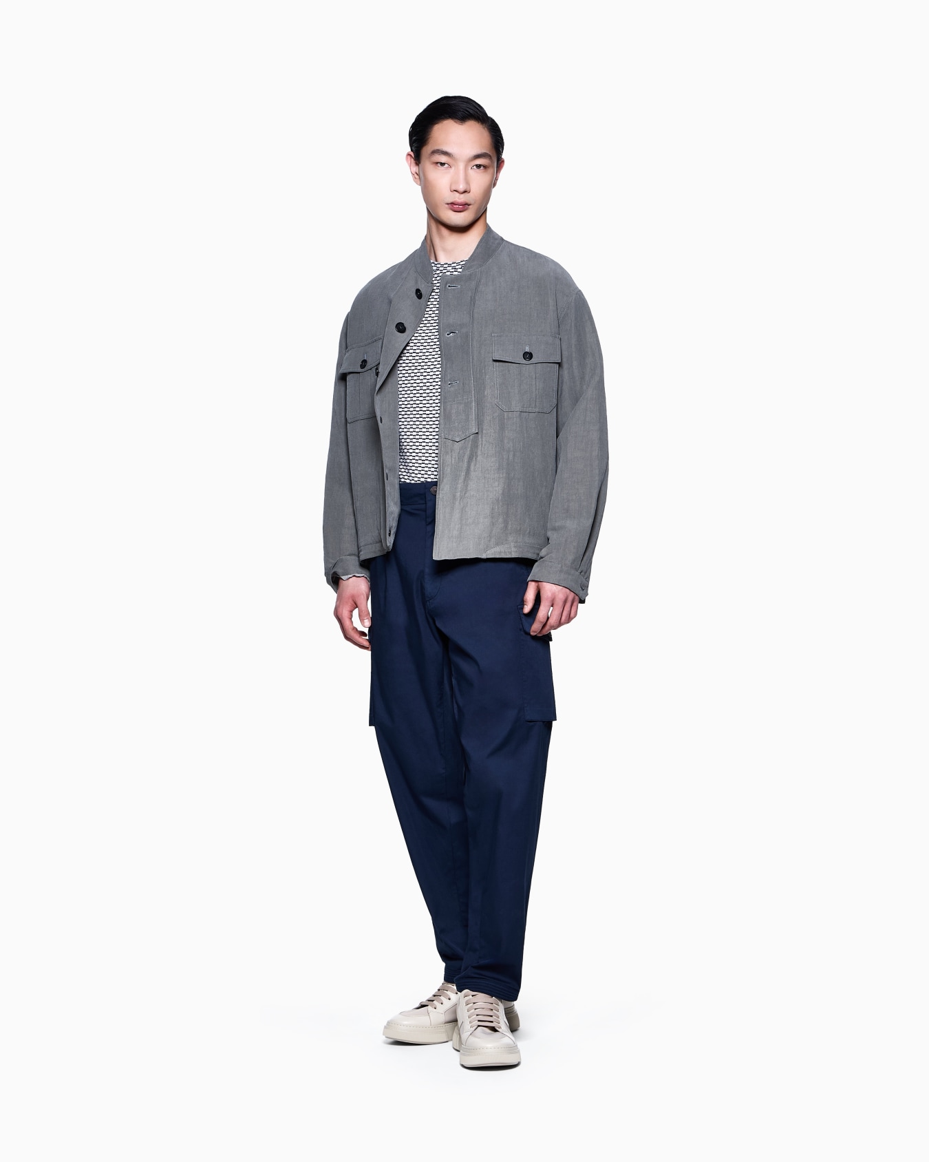 Cargo trousers in stretch cotton gabardine Slide 1