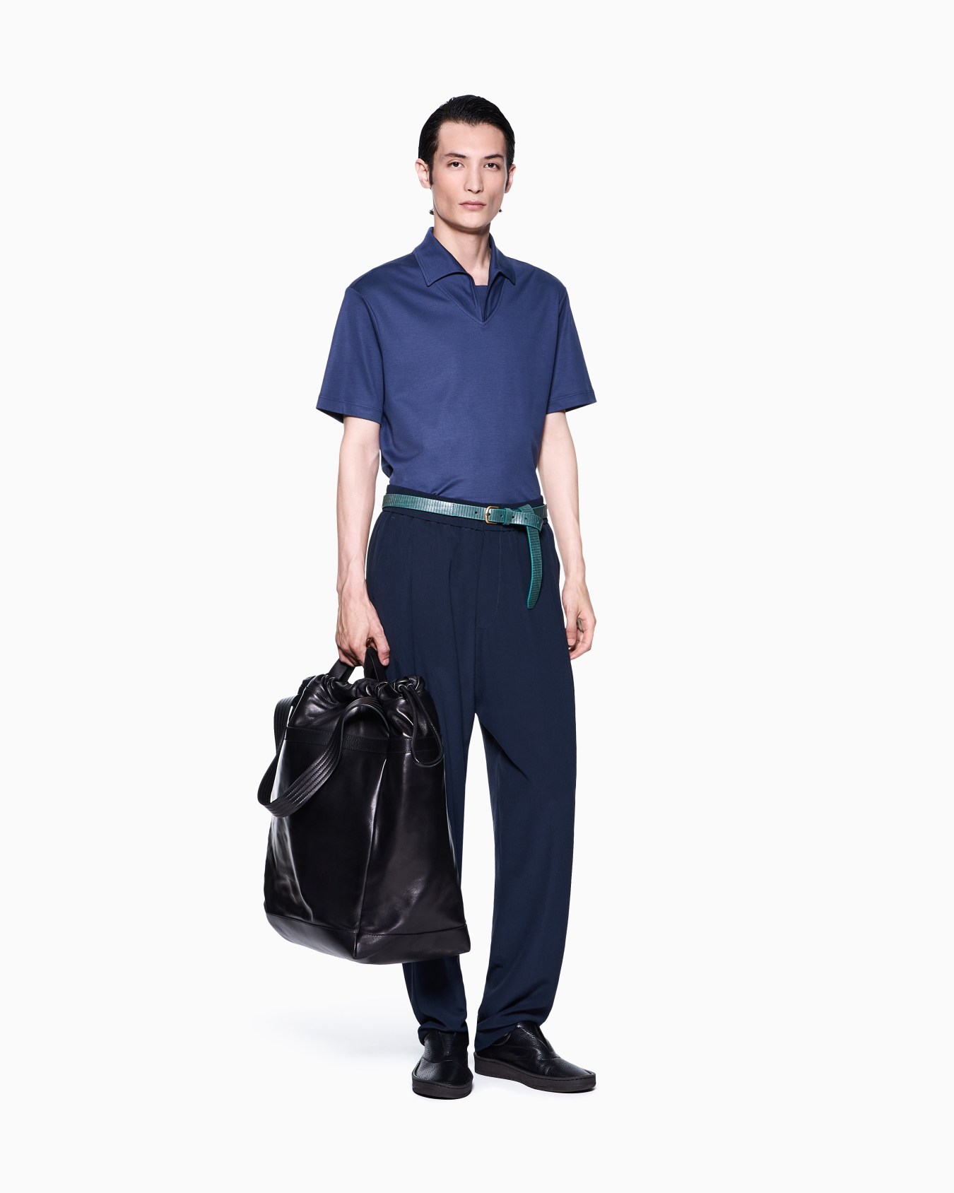 Short-sleeved polo shirt in organic cotton jersey Slide 1