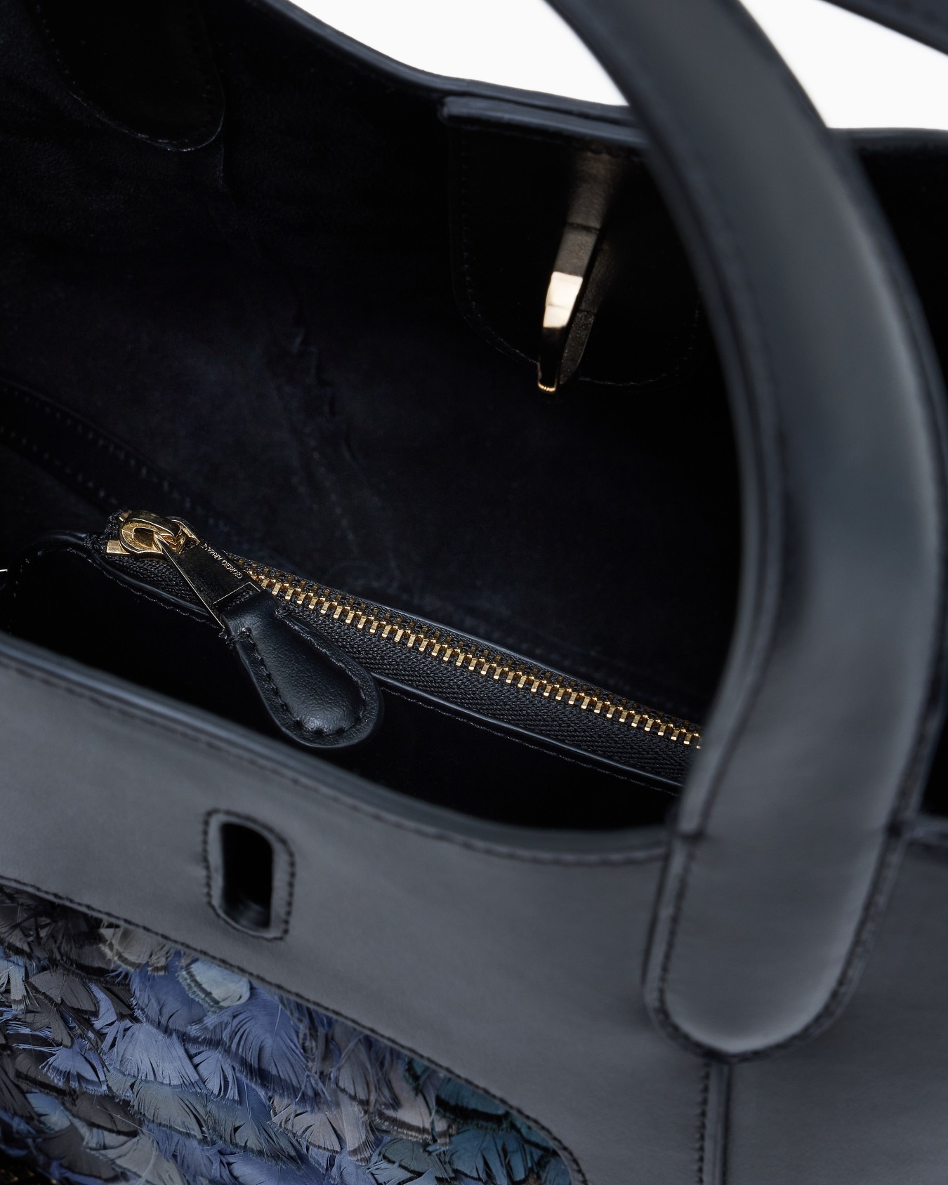 Small, smooth leather handbag with feathers Slide 3