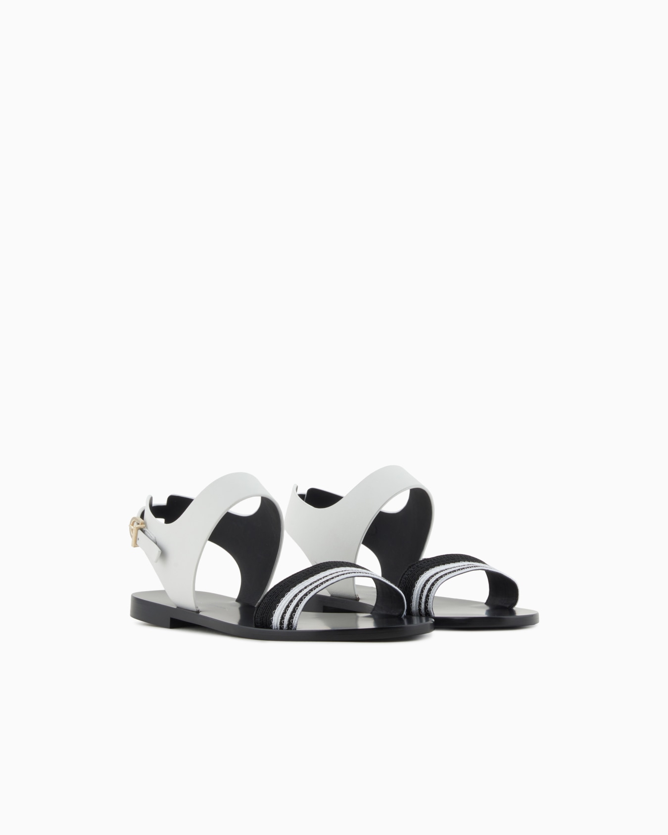 Flat sandals in leather and fabric Slide 1