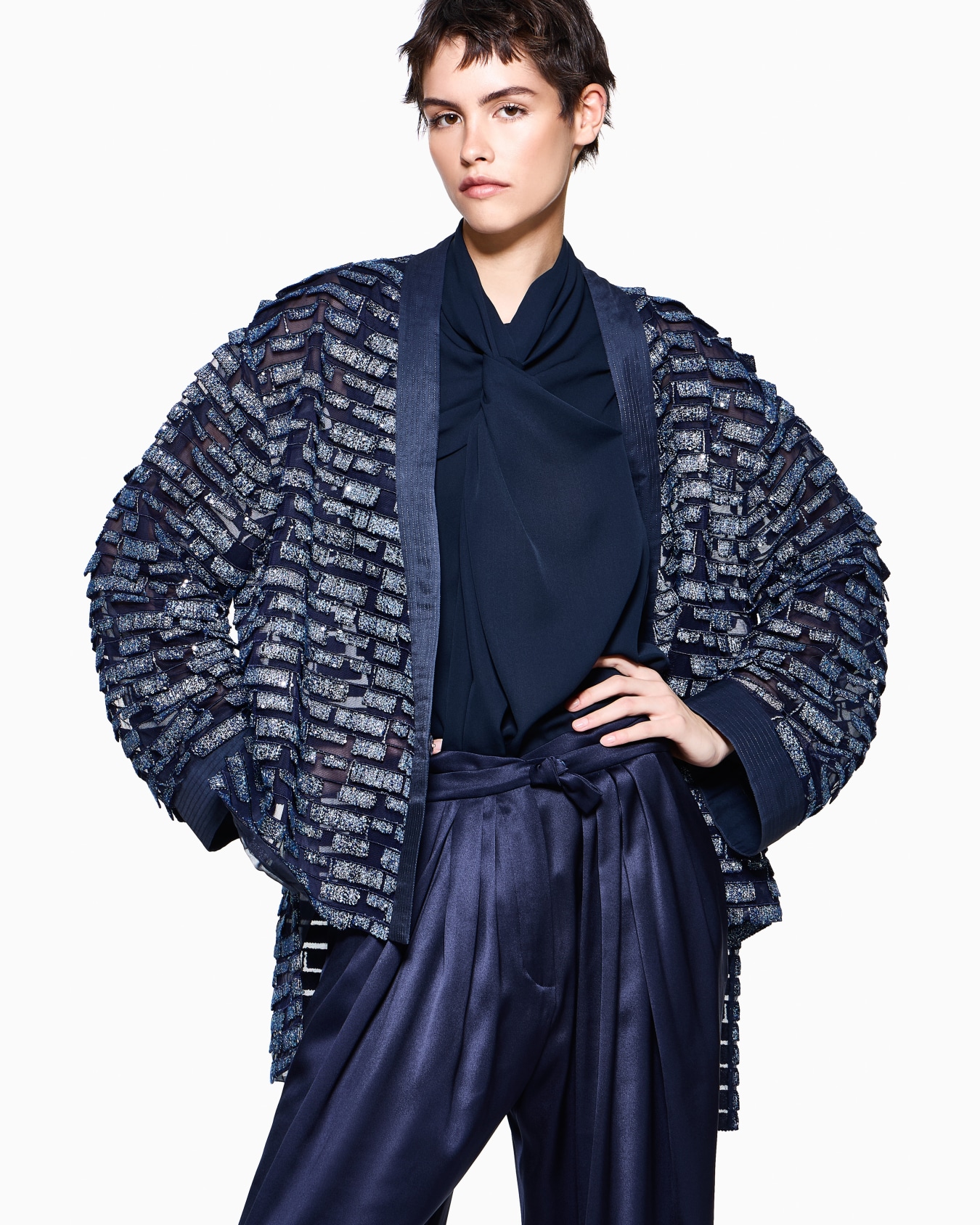 Multi-pleated trousers in silk satin with a waistband knot Slide 2