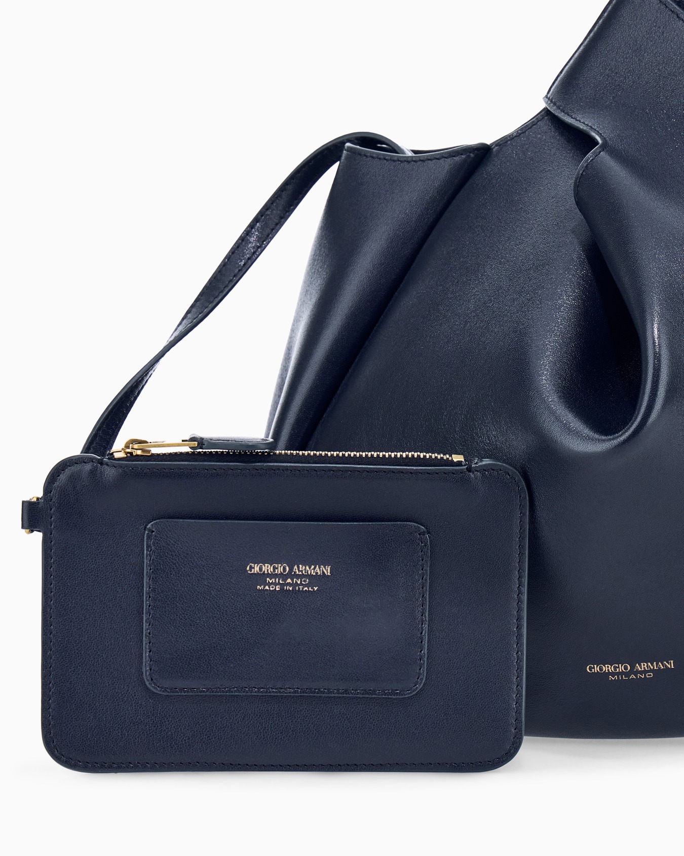 Bolso de mano de napa con diseño escultural y asa integrada Diapositiva 4