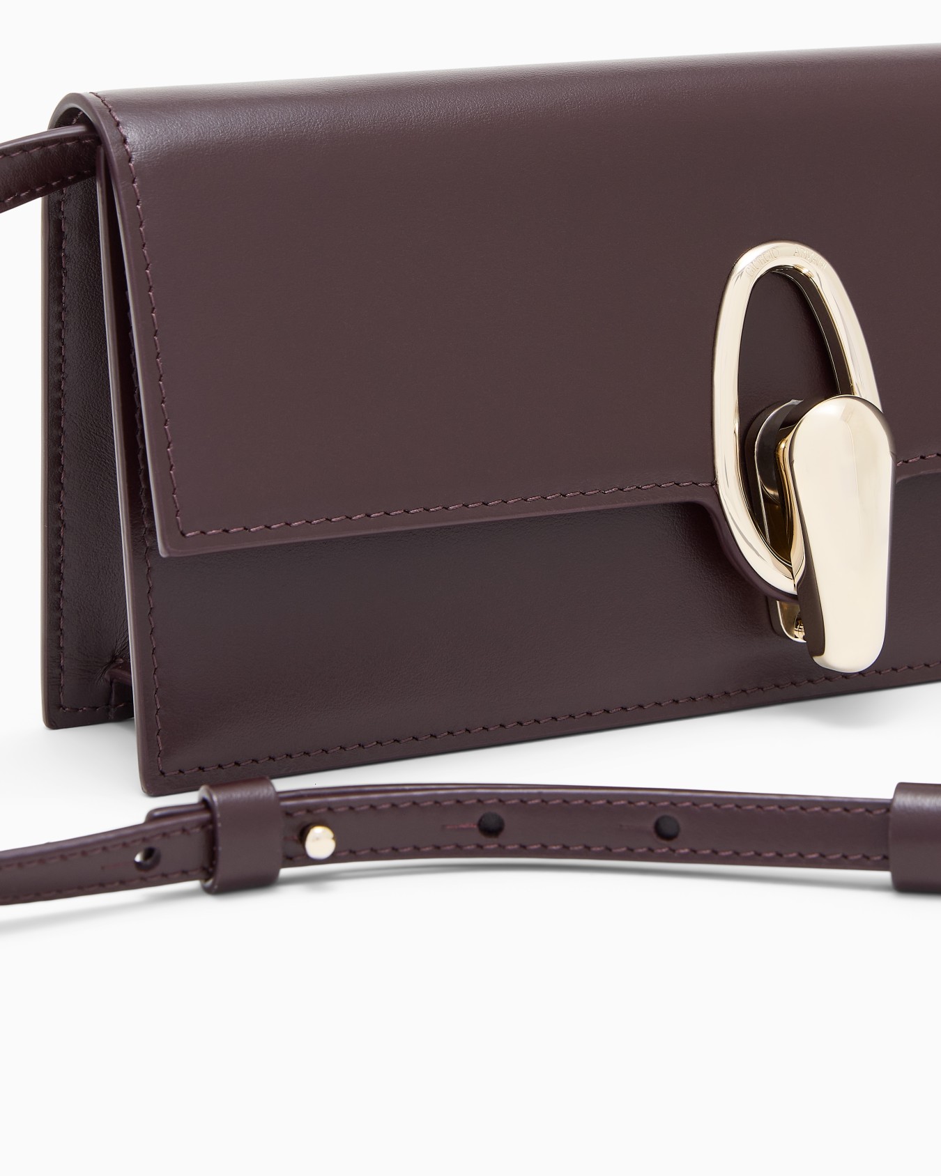 Accordion clutch in polished leather with a shoulder strap Slide 5