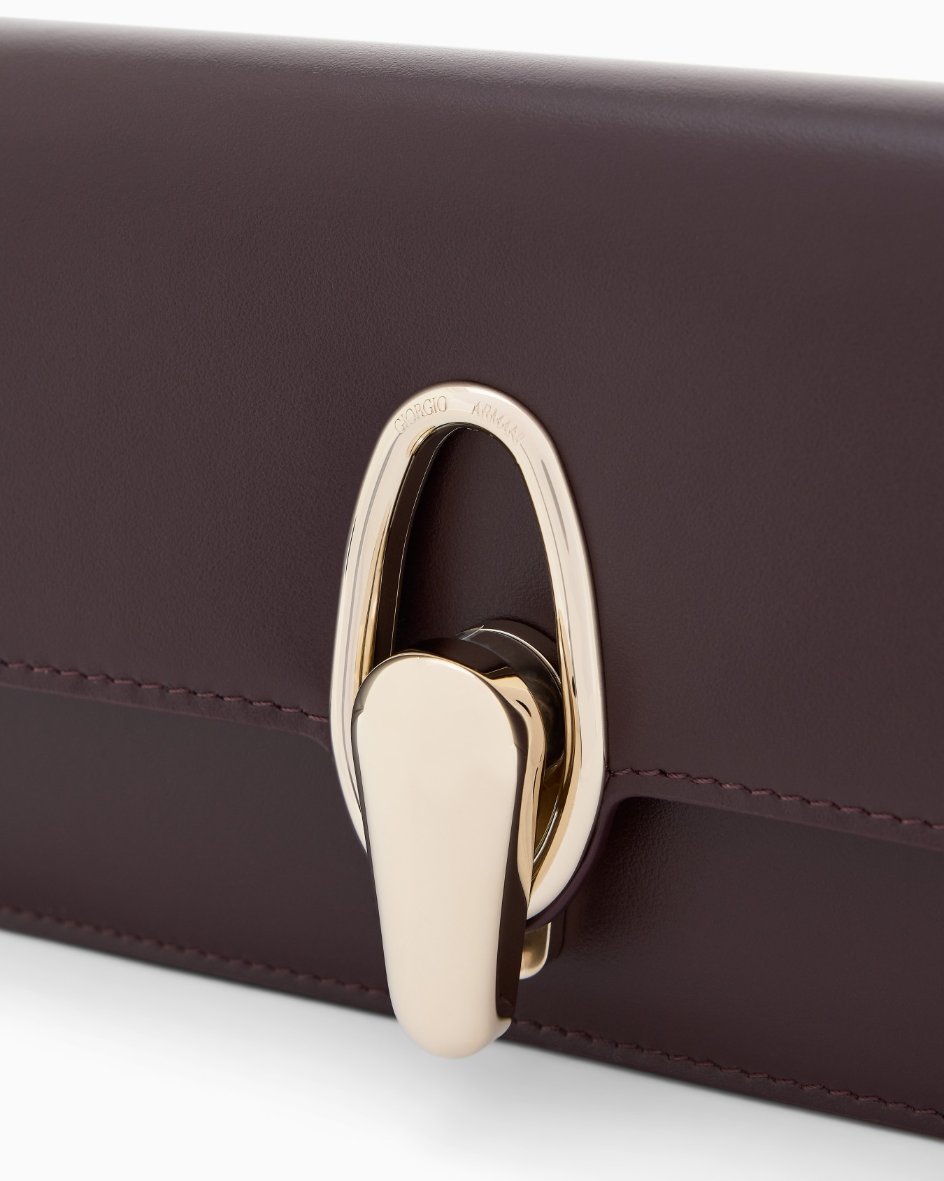 Accordion clutch in polished leather with a shoulder strap Slide 7