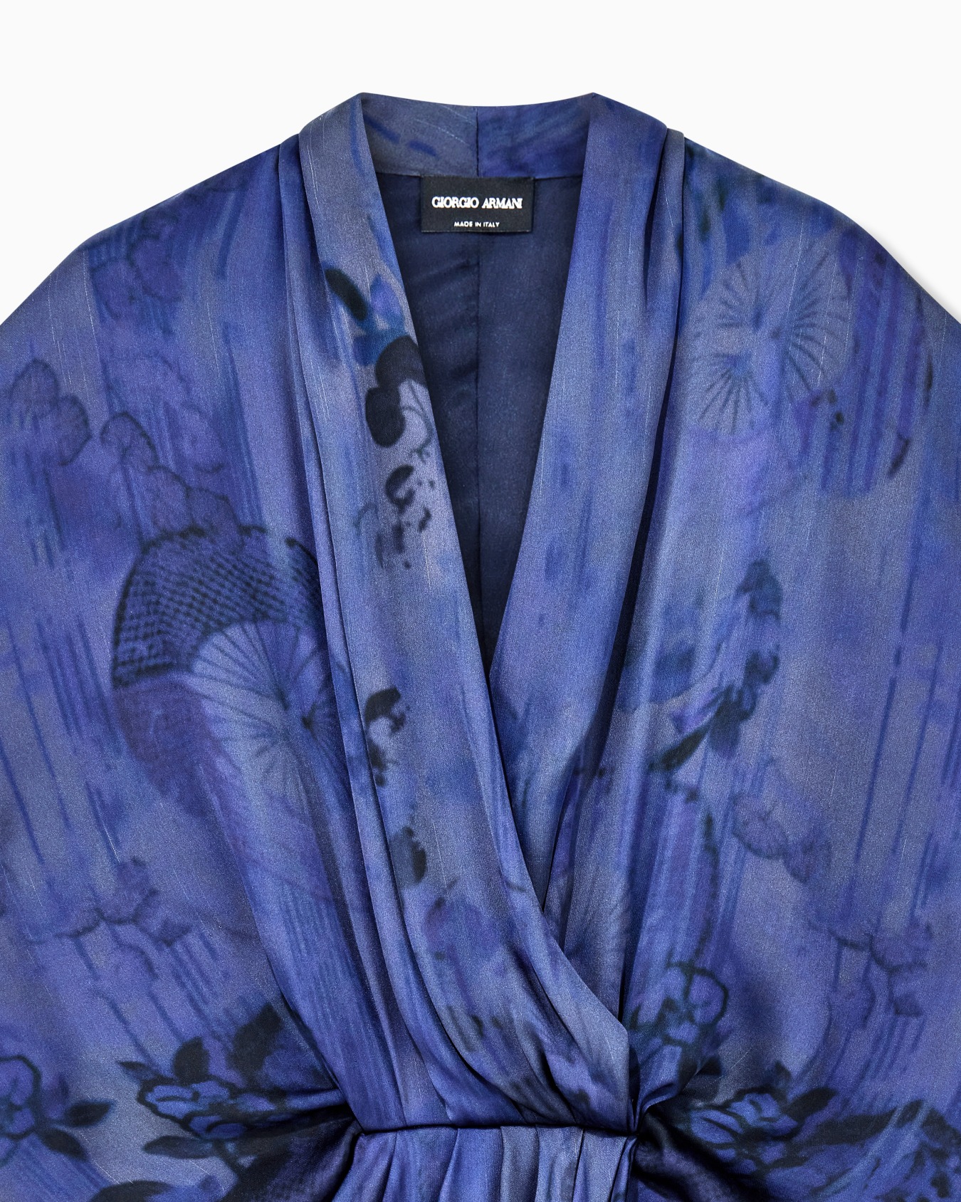 Draped silk dress with deep neckline and batik flower print Slide 4