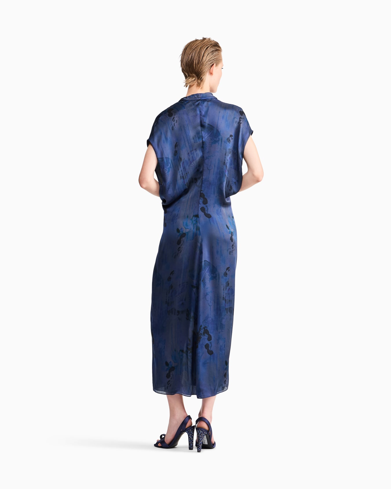 Draped silk dress with deep neckline and batik flower print Slide 5