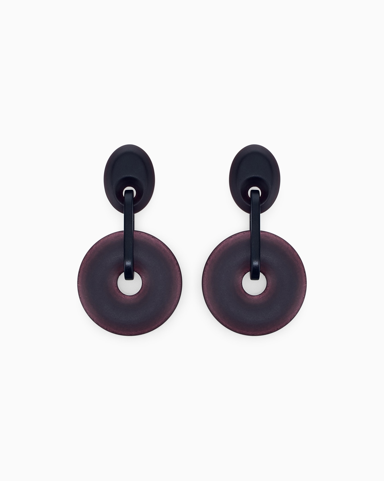 Pendientes circulares con acabado mate y textura jaspeada Diapositiva 0