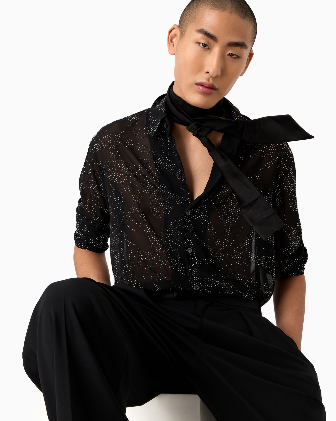 Pantaloni con pieghe godet in tela bi-stretch di lana vergine Slide 5