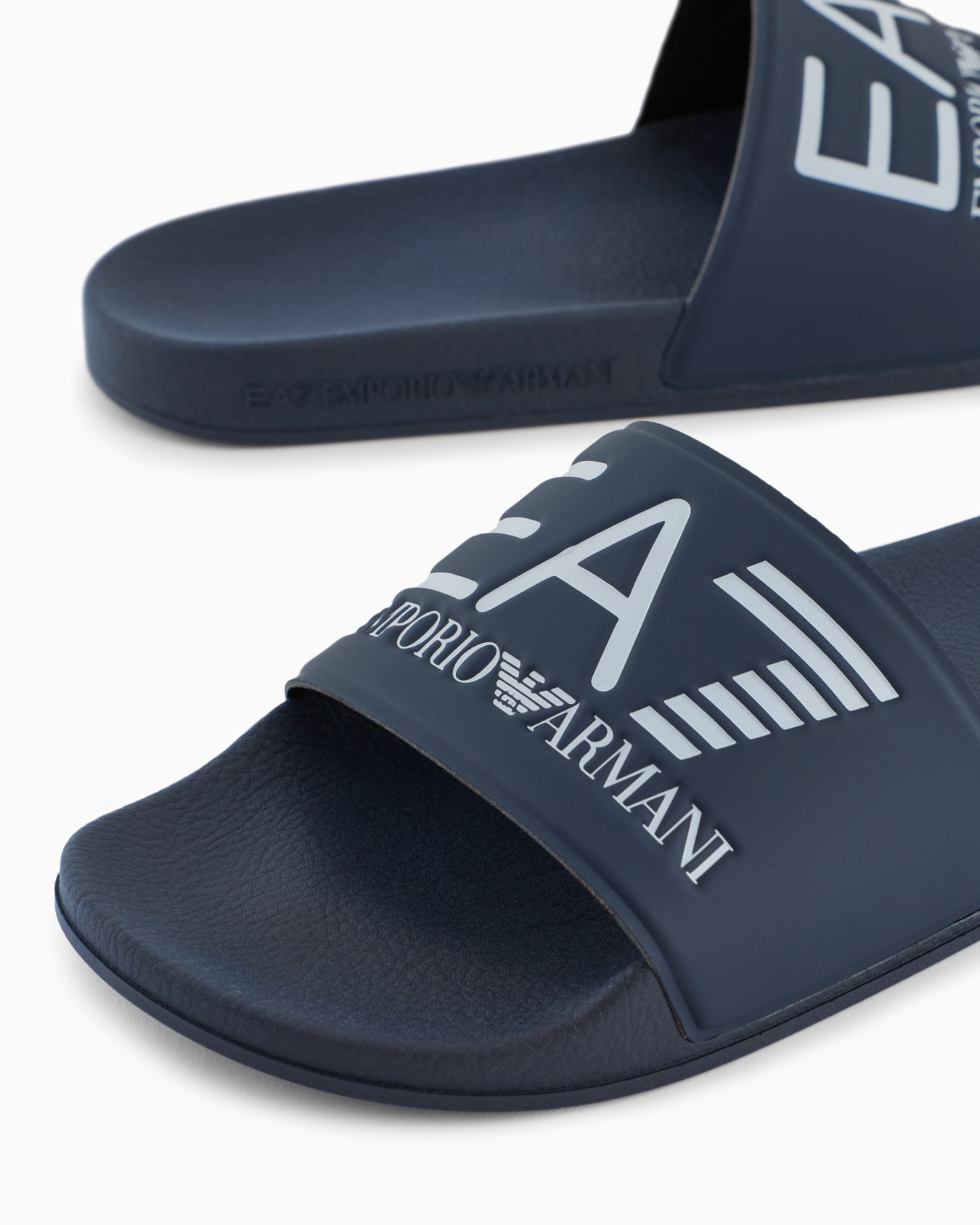 Sliders with oversized logo Slide 1