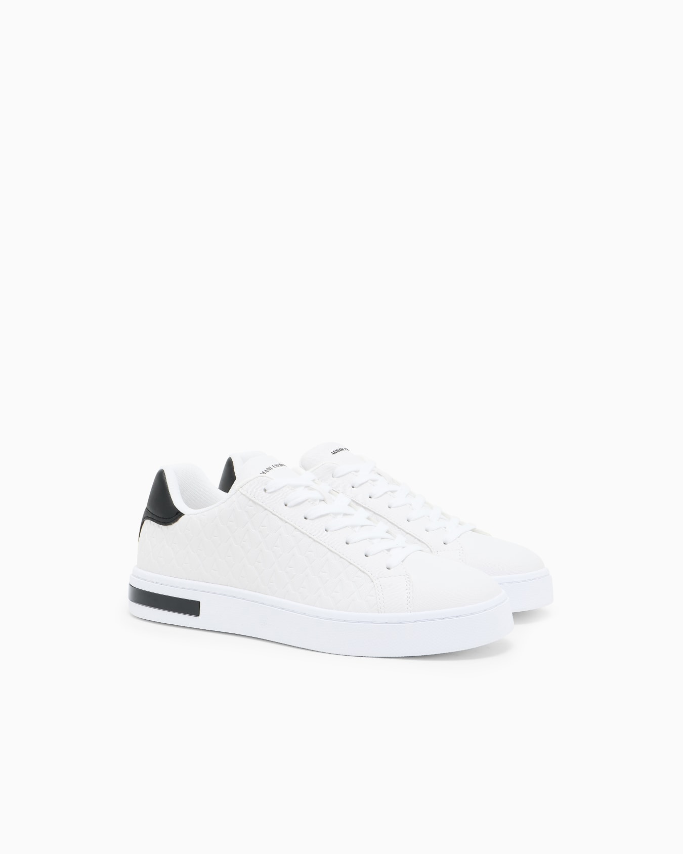 Lace-up sneakers with allover embossed logo Slide 1