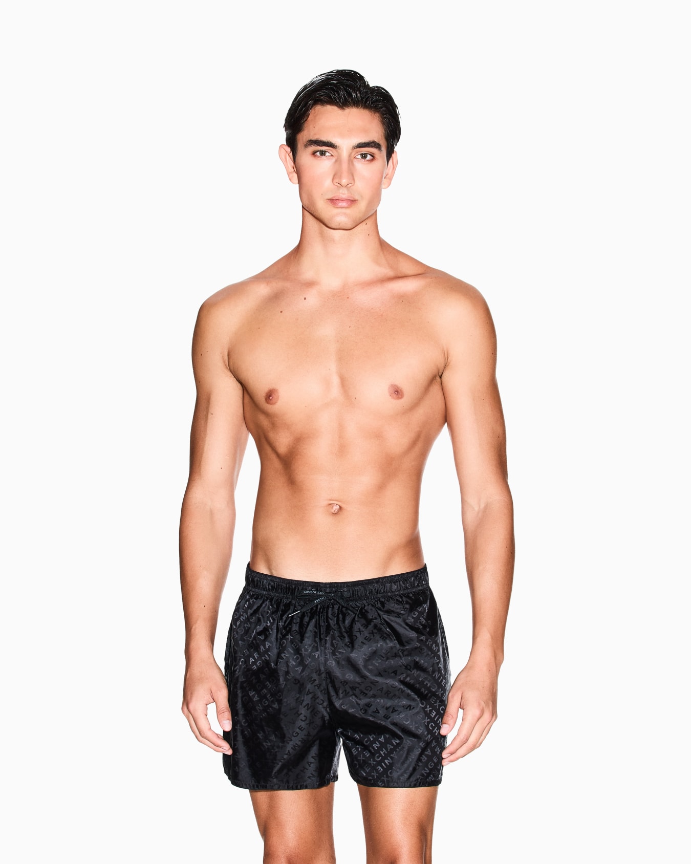 ALLOVER LOGO SWIM TRUNKS Slide 1