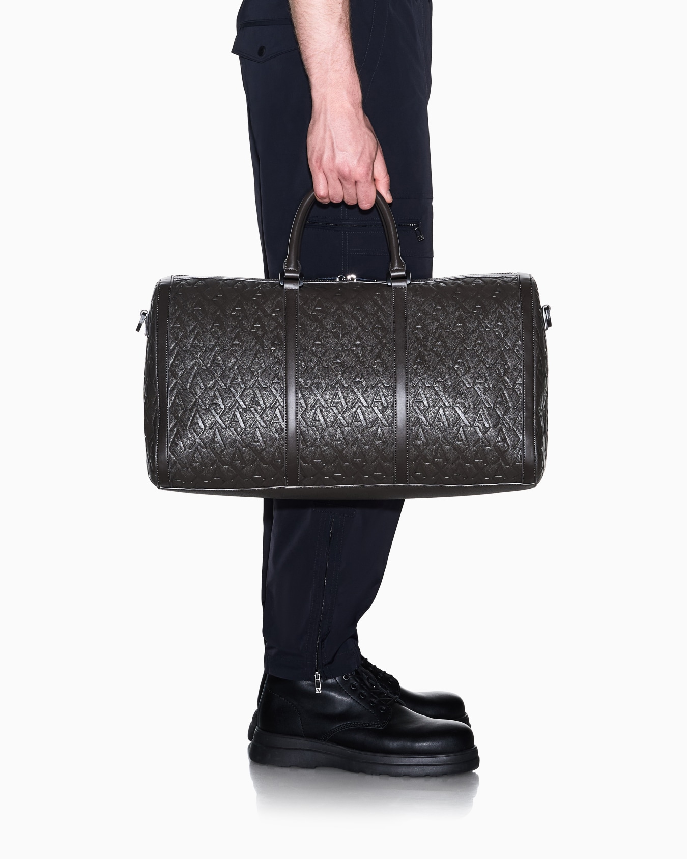 Duffel bag with an embossed pattern and a shoulder strap Slide 6