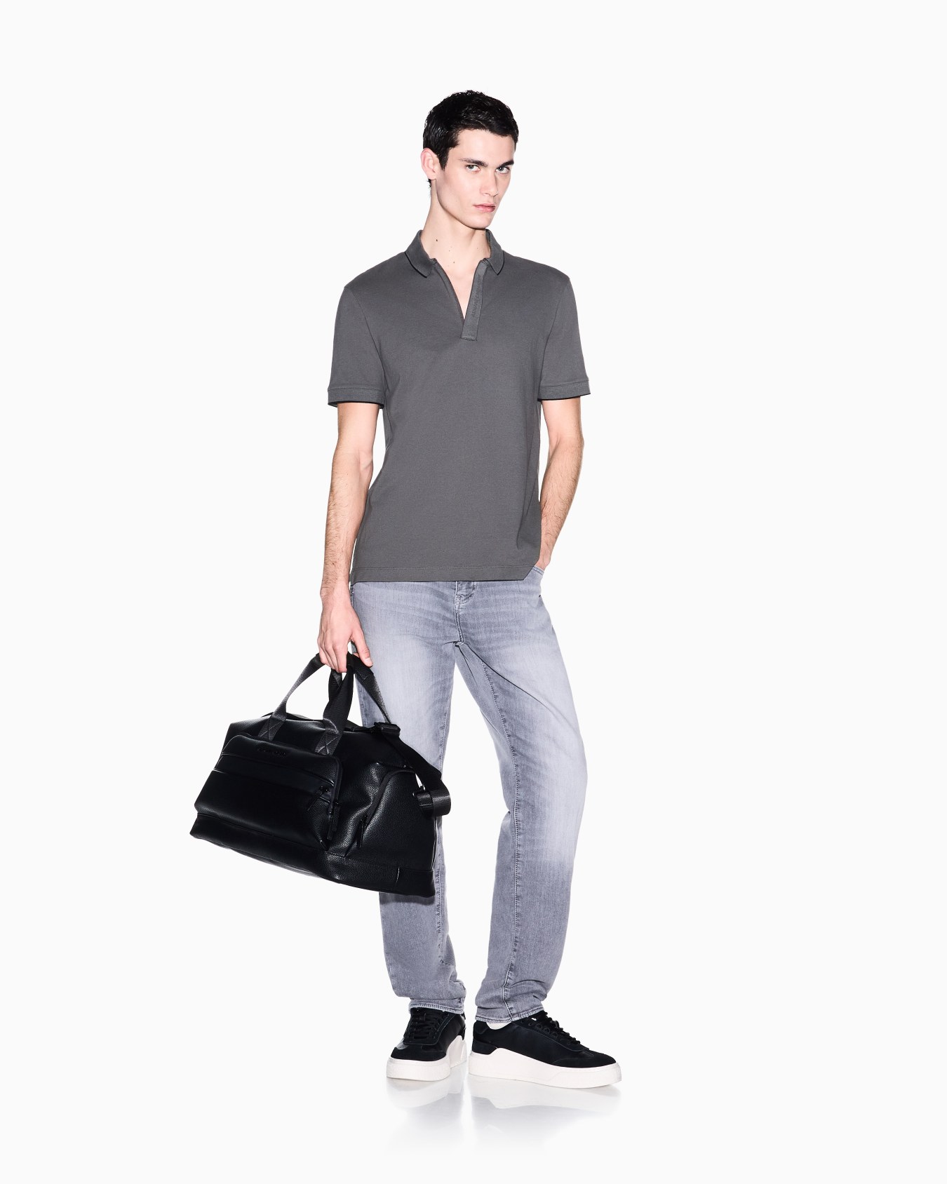 Slim fit polo with button insert Slide 1