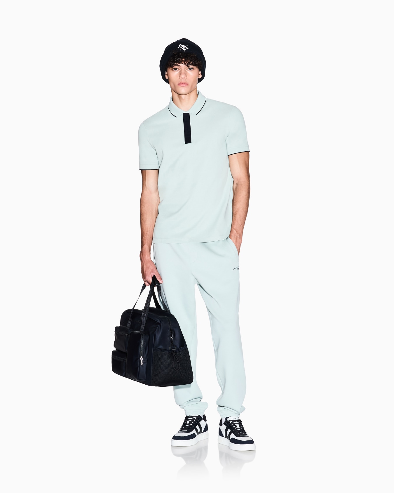 Slim fit polo with button insert Slide 1