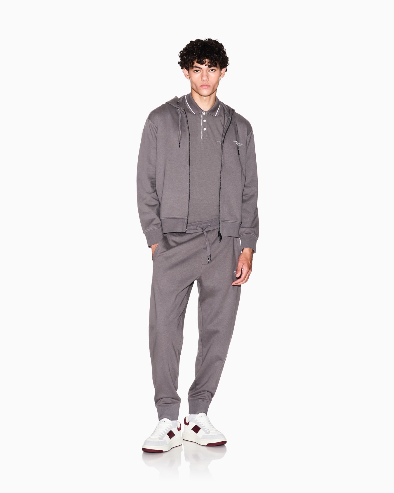 Polo regular fit in jersey stretch Slide 1
