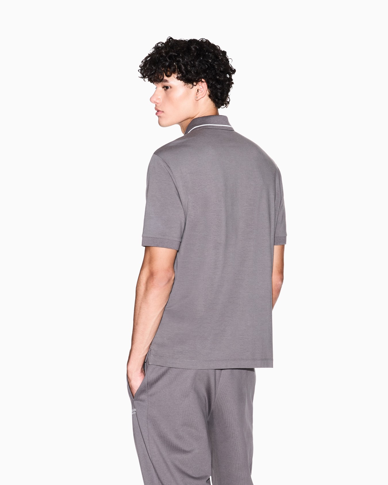 Polo regular fit in jersey stretch Slide 2