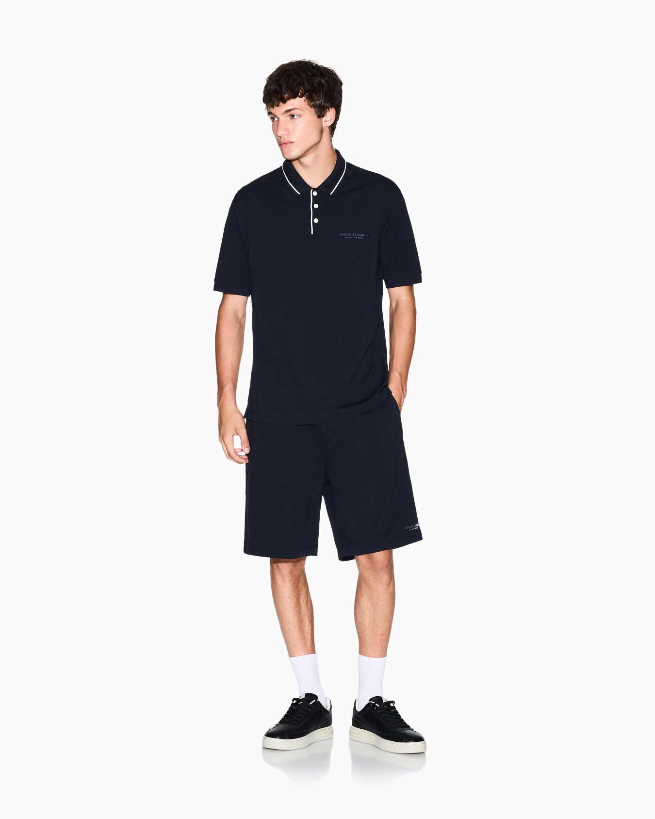 Regular fit polo shirt in stretch jersey Slide 1