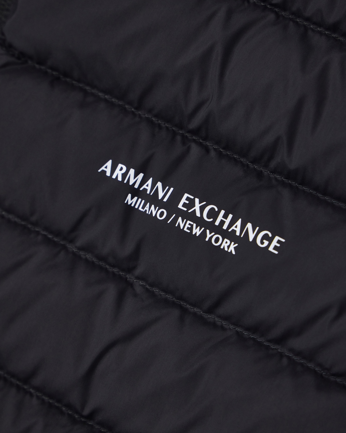 Quilted full-zip down vest with a high collar Essential Slide 4