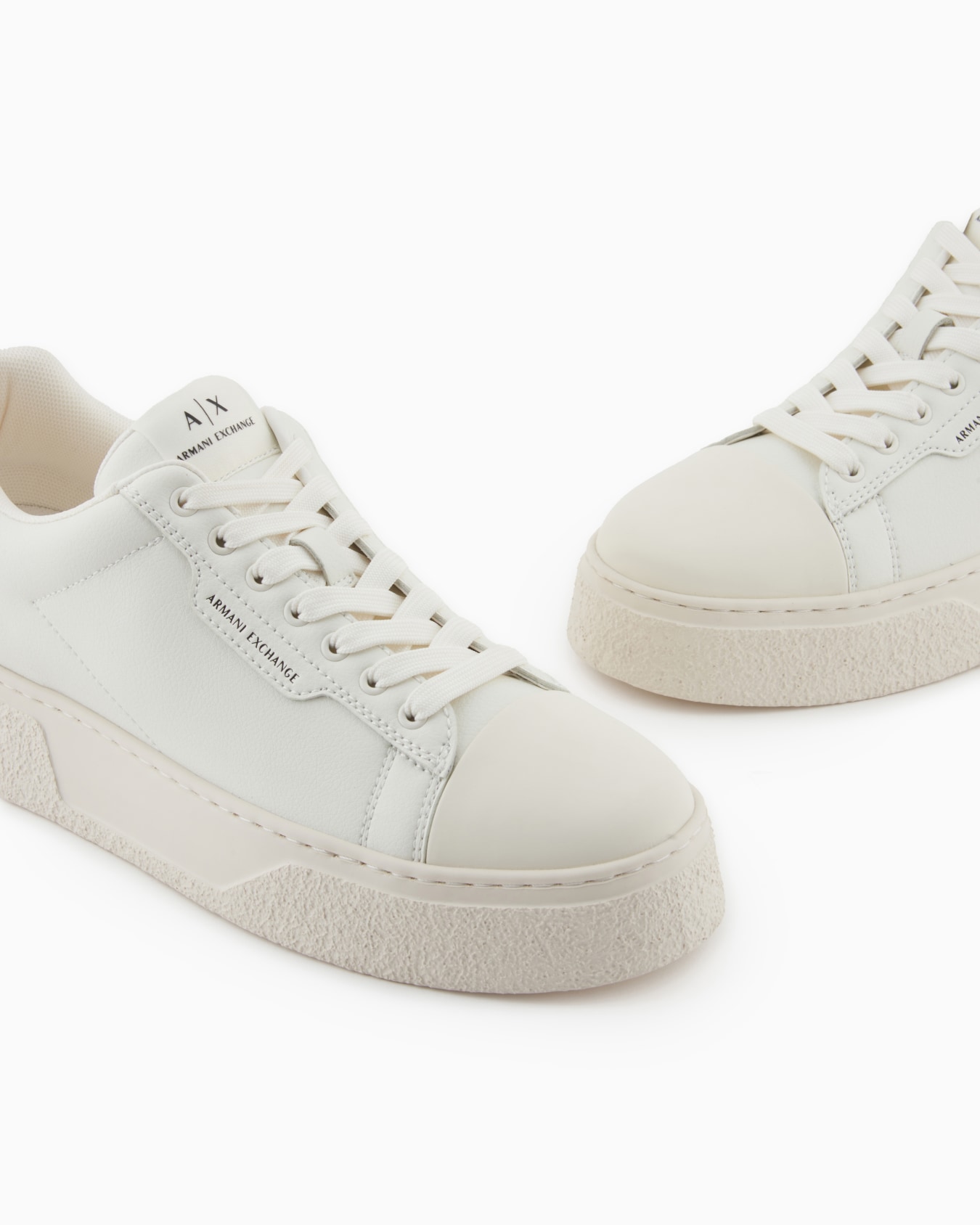 Low-top sneakers in smooth leather with an embossed logo Slide 4