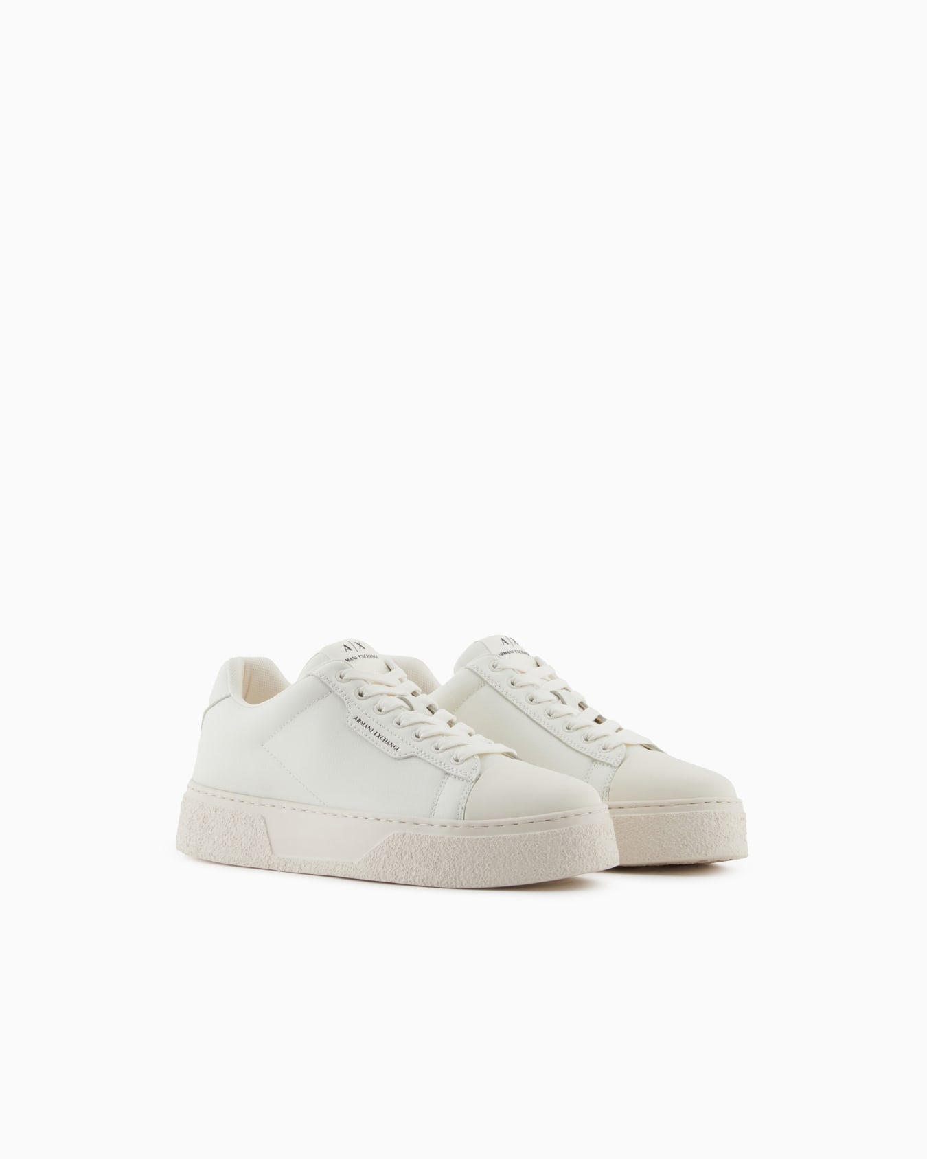 Low-top sneakers in smooth leather with an embossed logo Slide 1