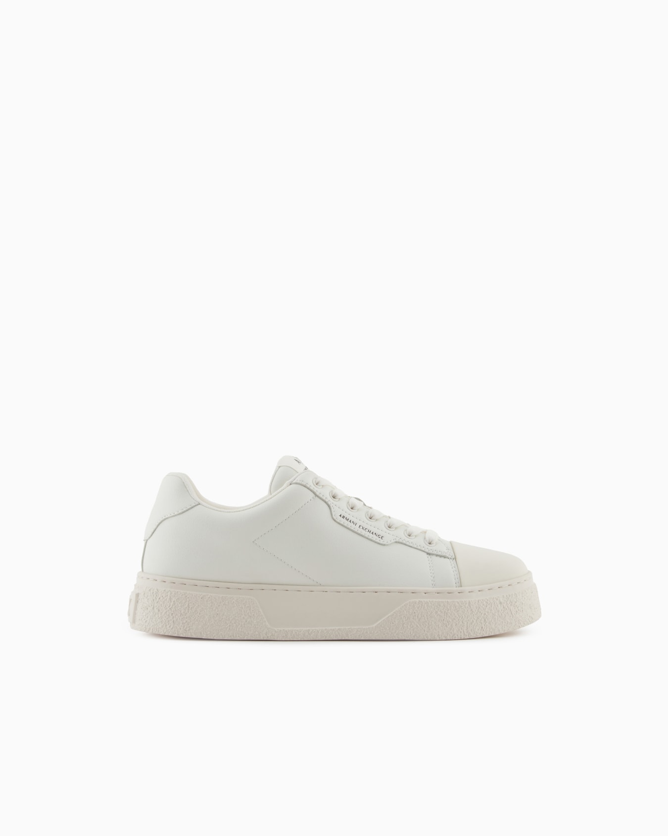 Low-top sneakers in smooth leather with an embossed logo Slide 0