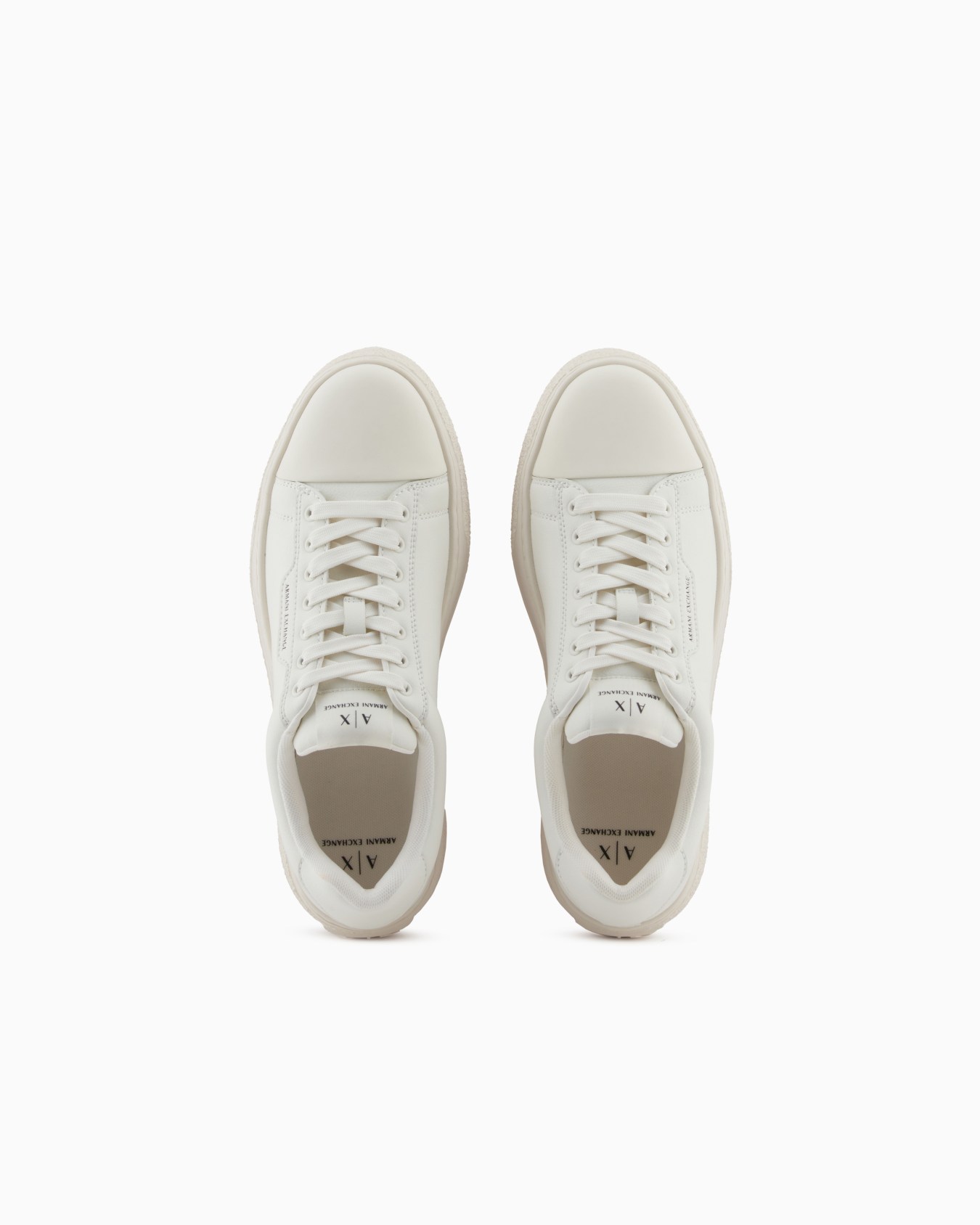 Low-top sneakers in smooth leather with an embossed logo Slide 2