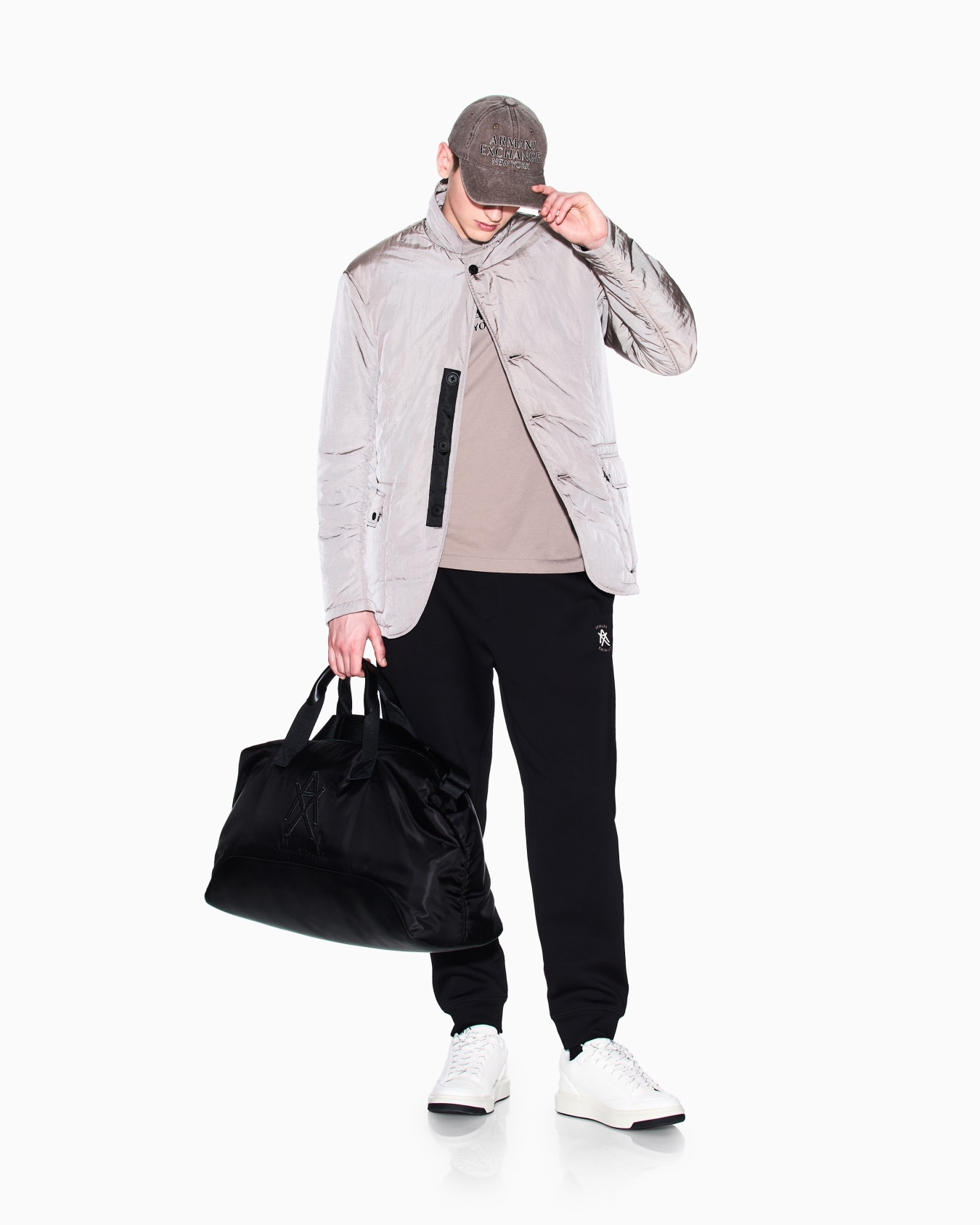 Jogger trousers in bonded fabric Slide 1