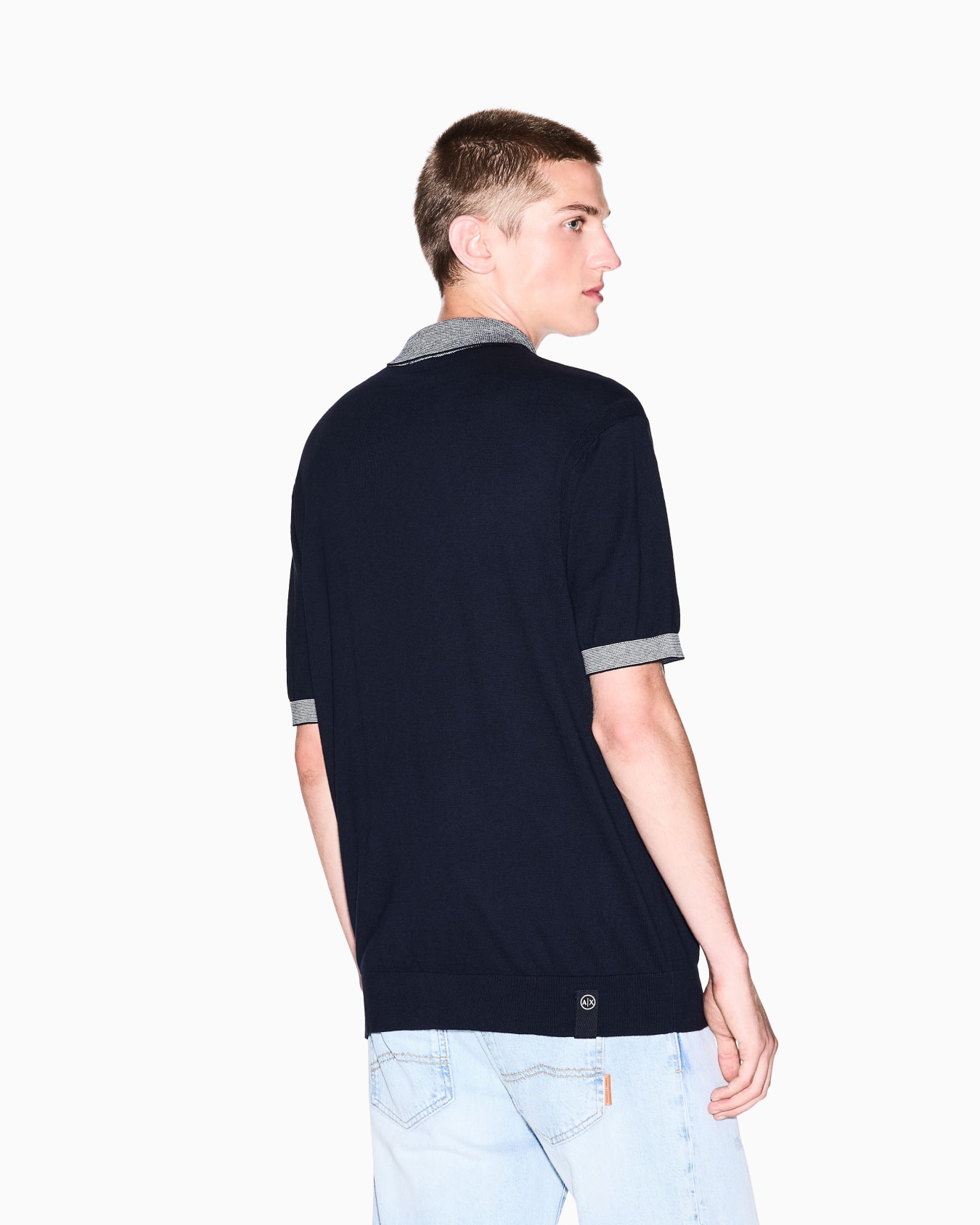 Knitted polo shirt with contrasting profiles Slide 2