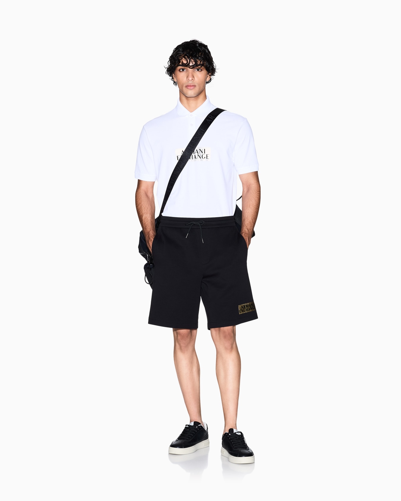 Regular fit cotton polo shirt with gold details Slide 1