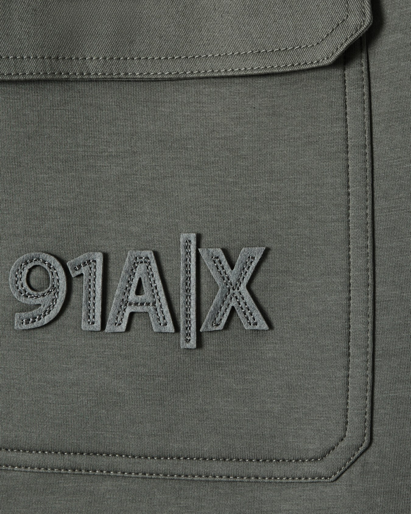 Jogger trousers in bonded fabric Slide 3