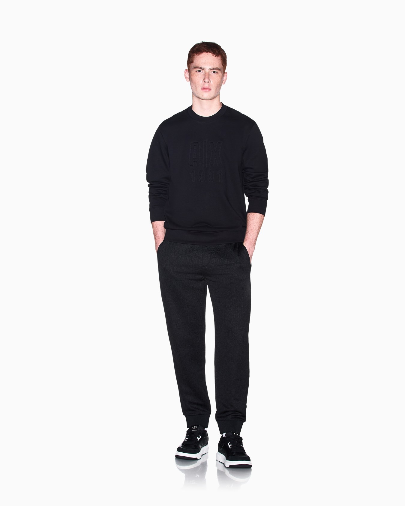 regular fit trousers in stretch jacquard jersey Slide 1
