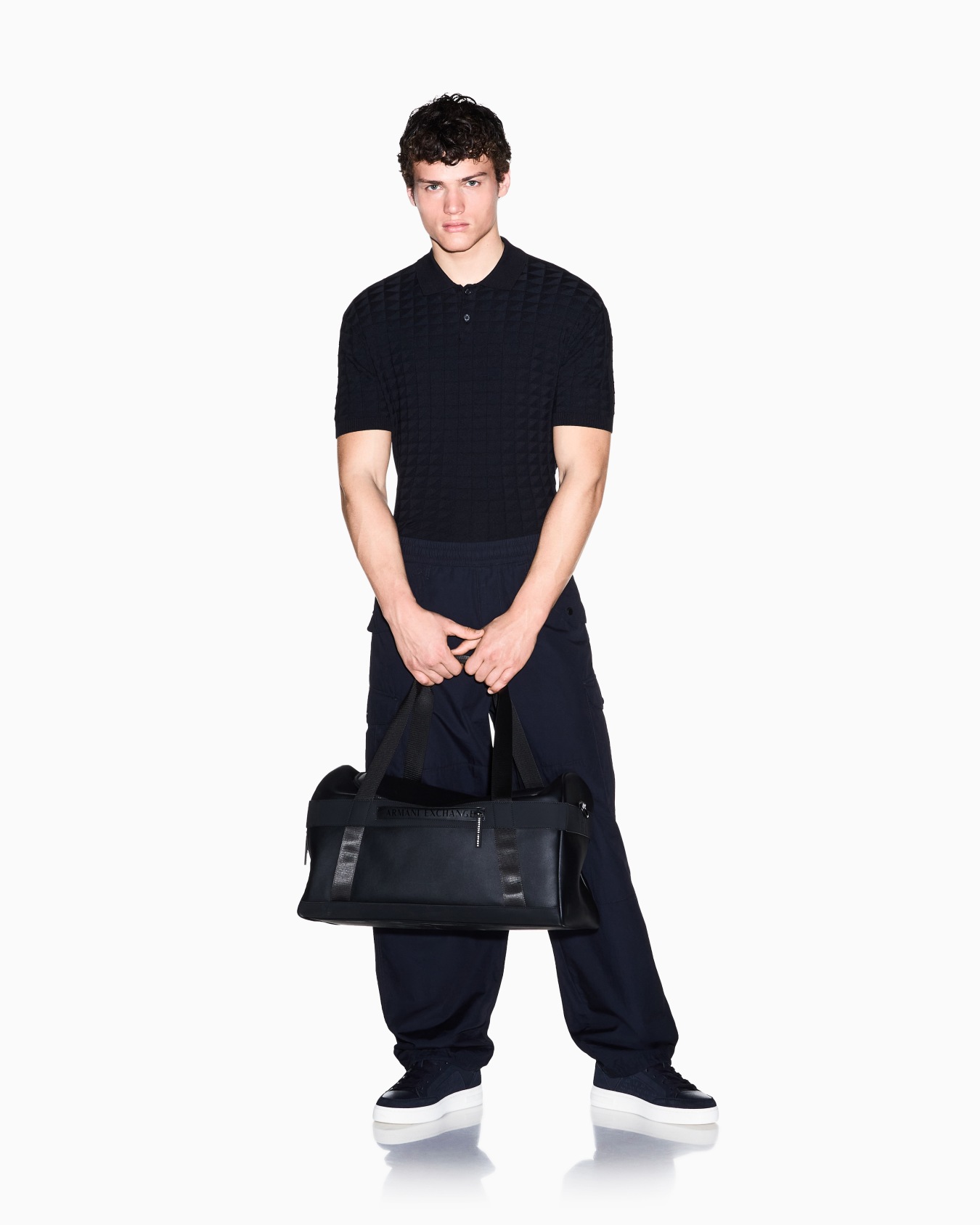 regular fit knit polo in viscose mix Slide 1