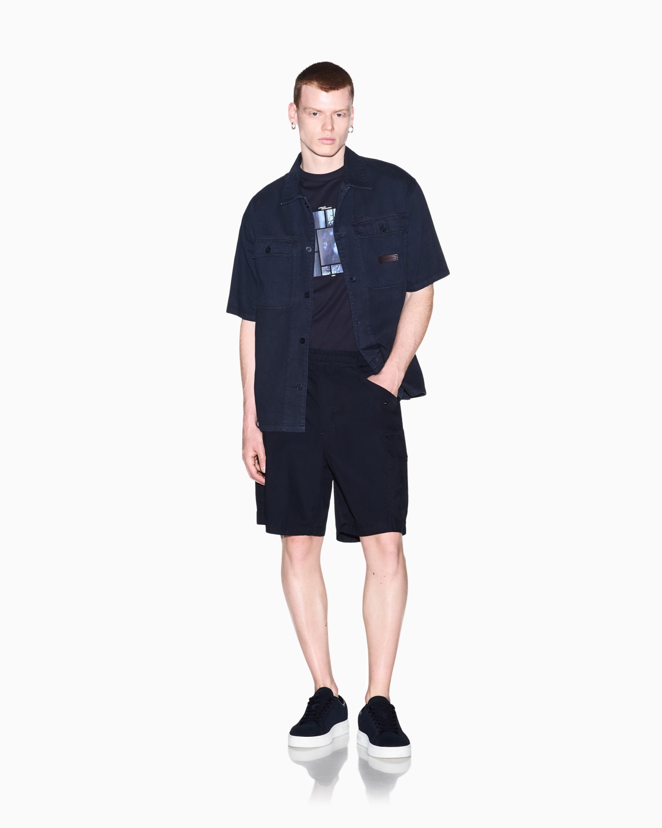 T-shirt slim fit in jersey di cotone con stampa grafica Slide 1