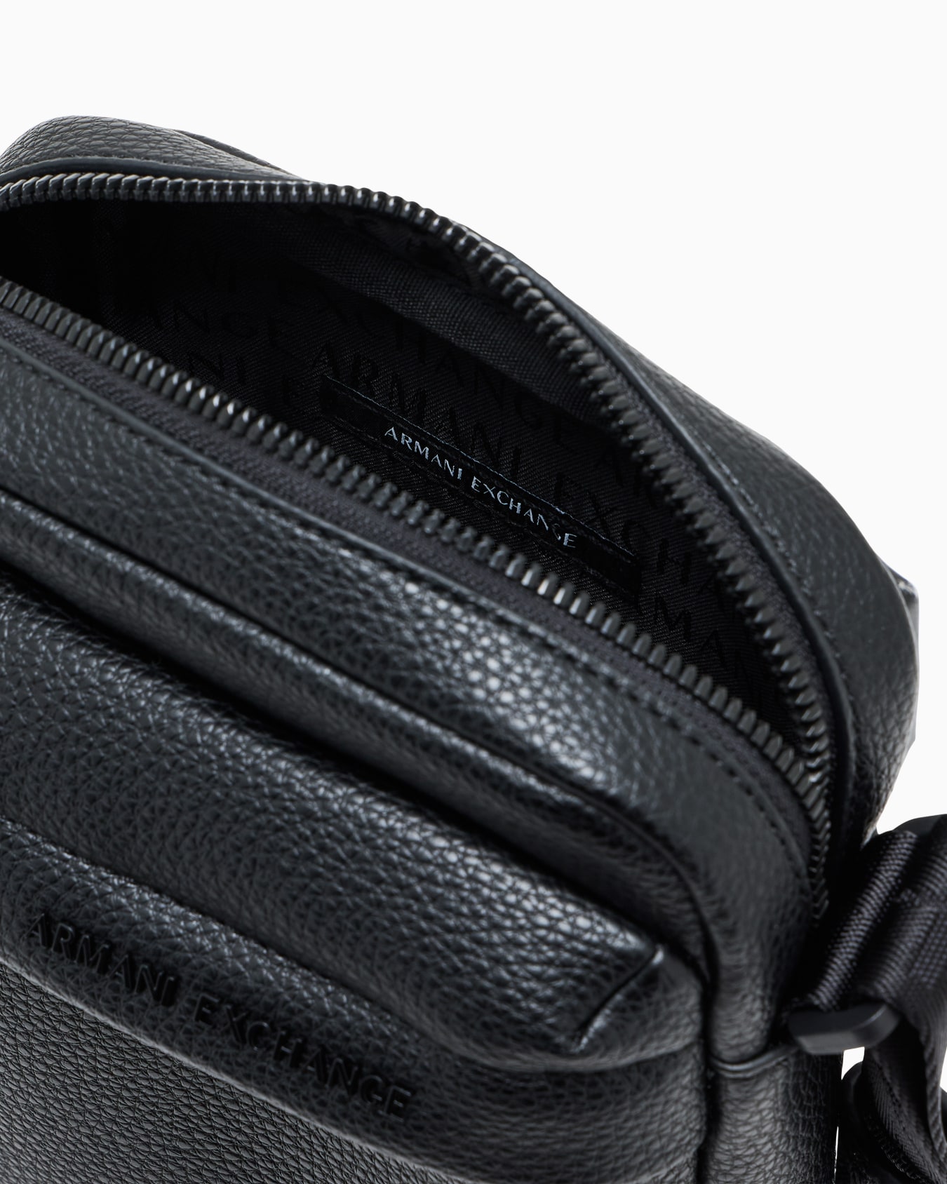 Textured crossbody bag with an embossed logo on the flap Slide 3