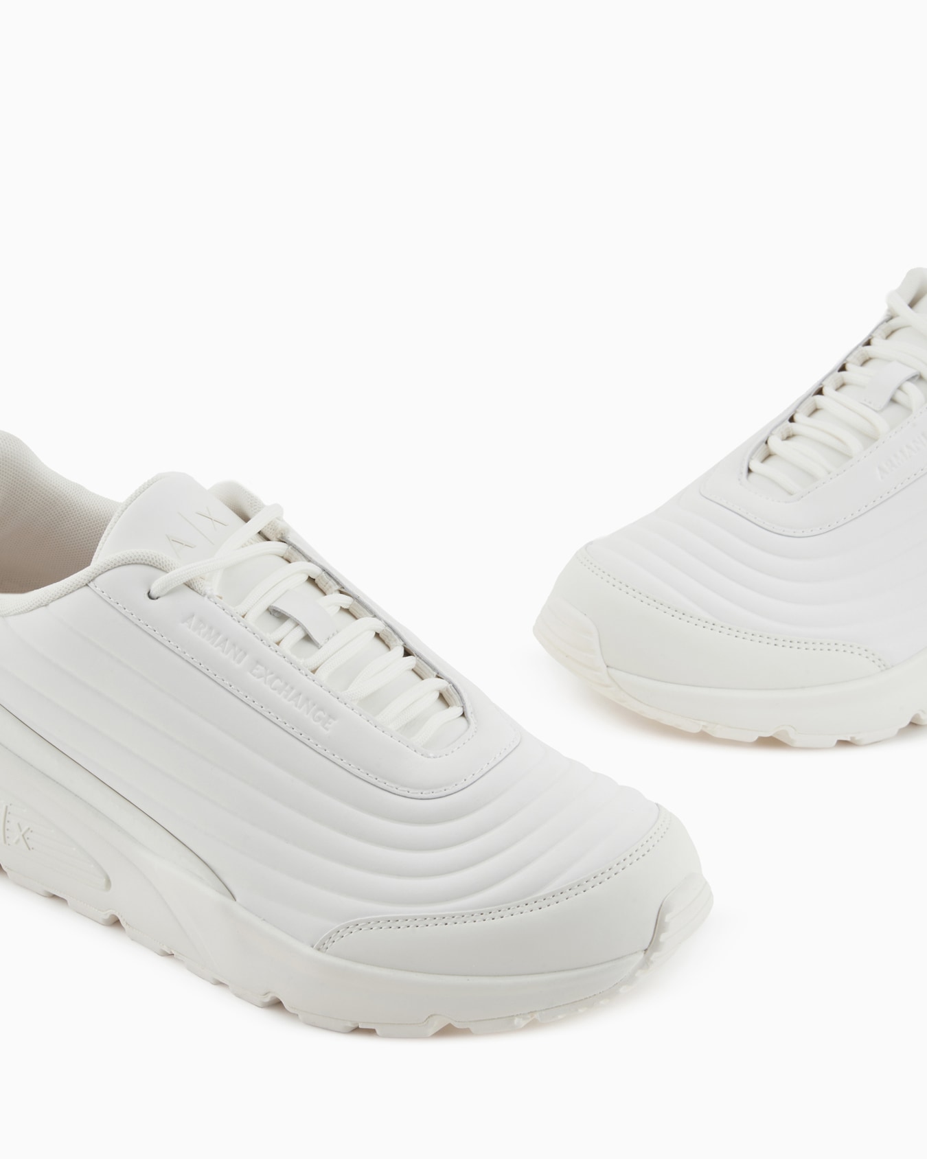 Sneakers in eco-leather with optical effect grooves Slide 4