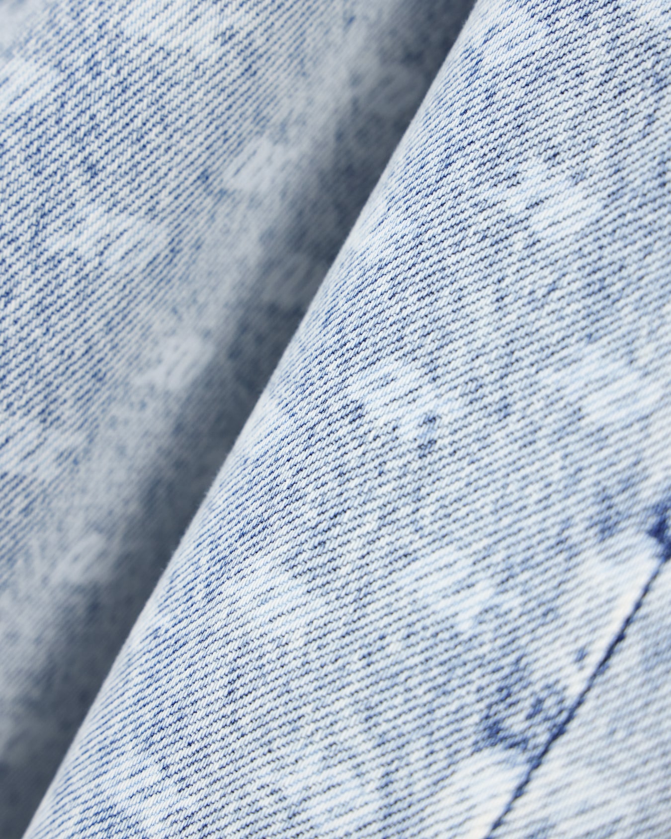 Oversized five-pocket denim pants with an allover print Slide 4