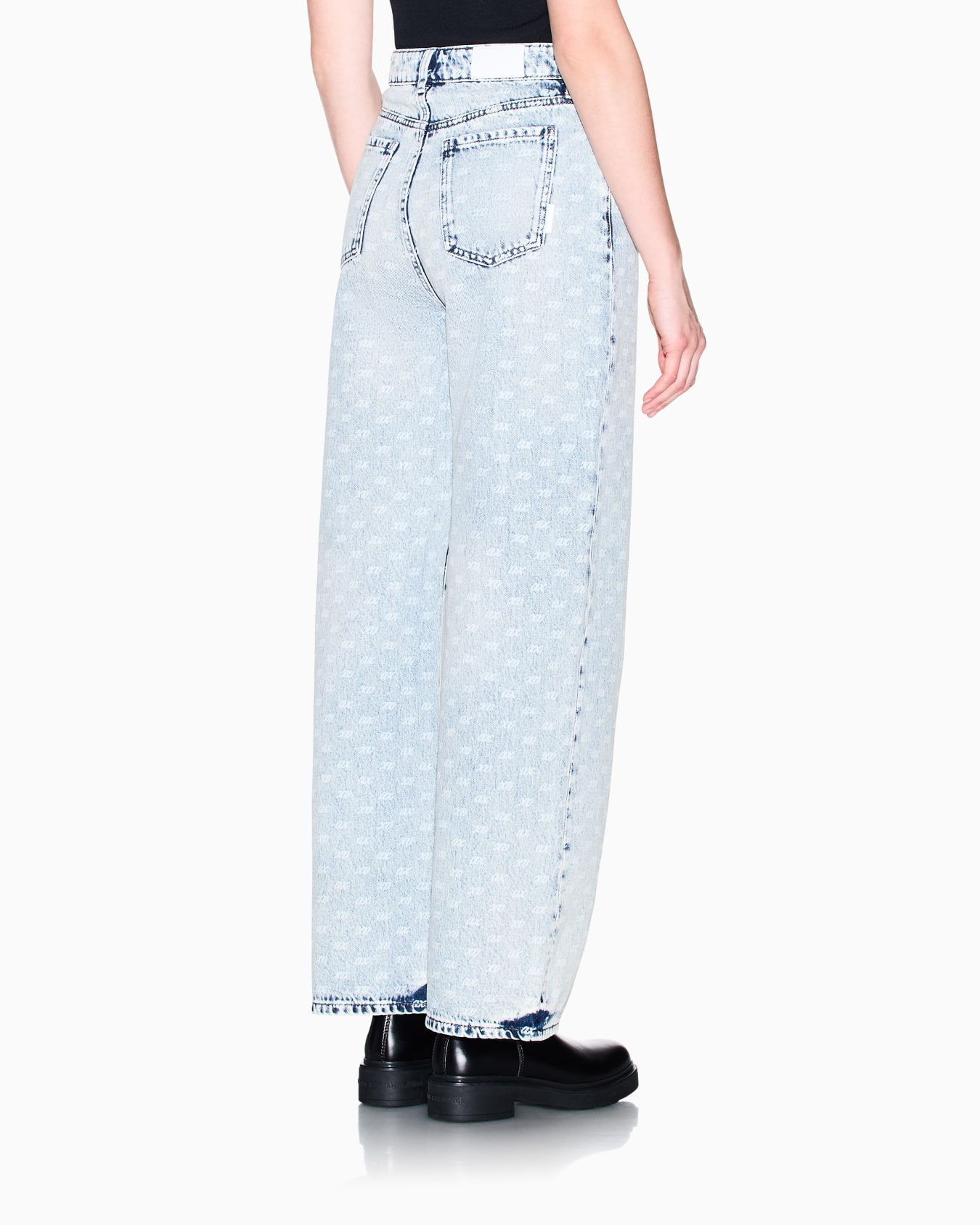 Oversized five-pocket denim pants with an allover print Slide 5