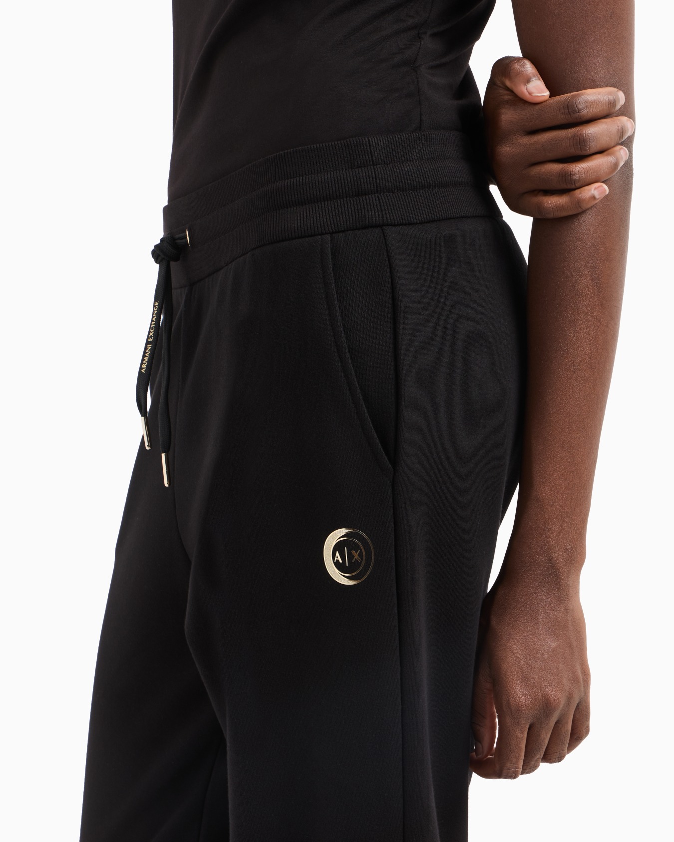 Jogger pants with metal logo Slide 4
