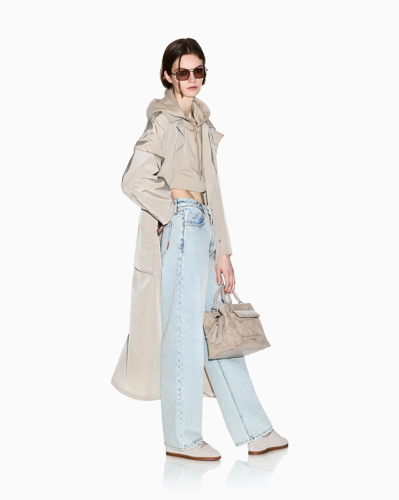 Trench coats in mixed fabric Slide 1