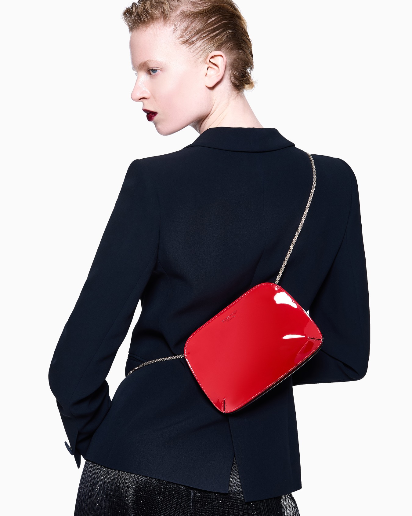 La Prima clutch bag in patent leather Slide 6