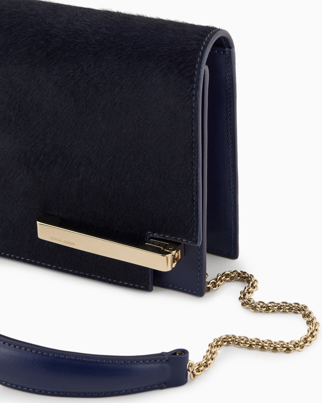 Ponyskin-look leather clutch bag Slide 4