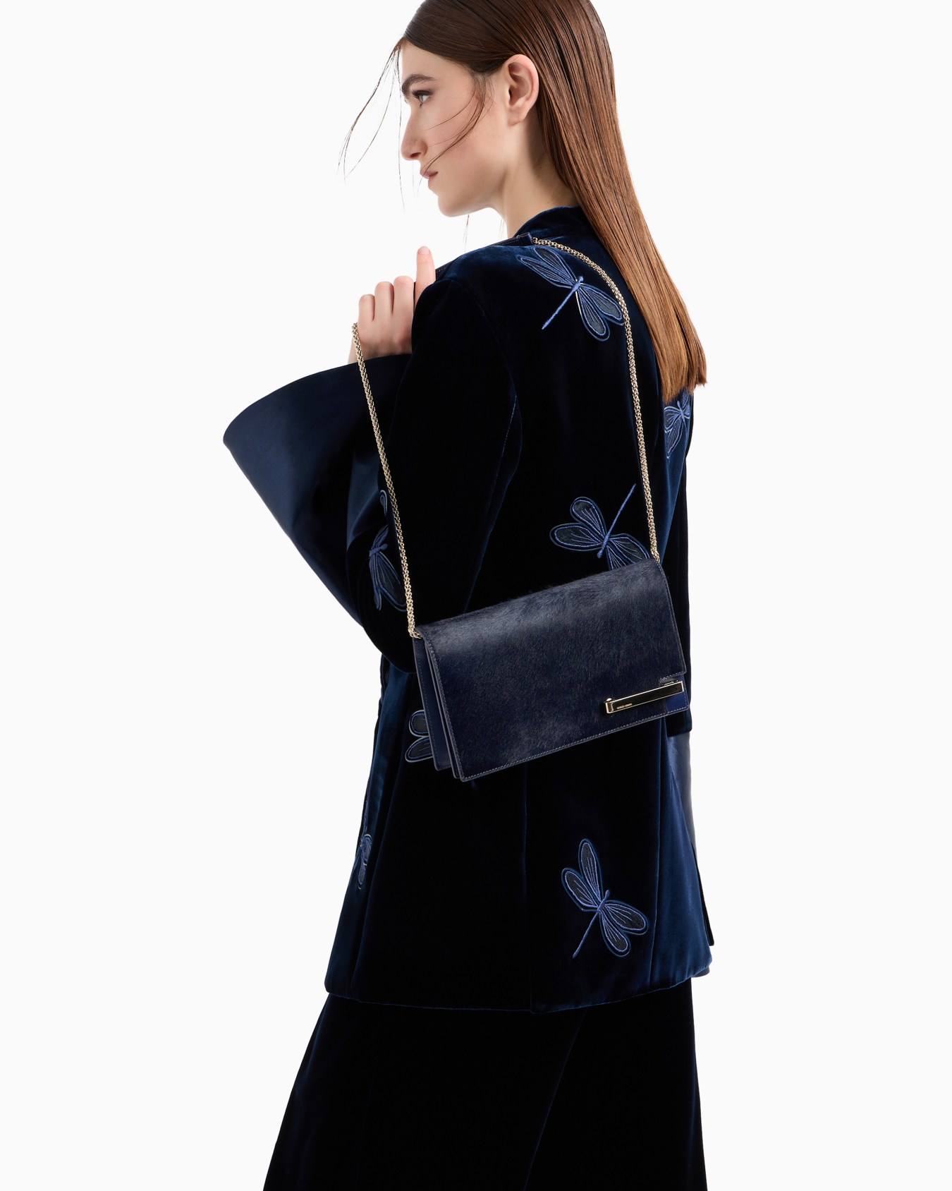 Ponyskin-look leather clutch bag Slide 6